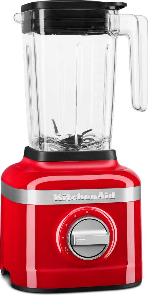 Blender KitchenAid rouge avec bocal en verre et couvercle noir.
