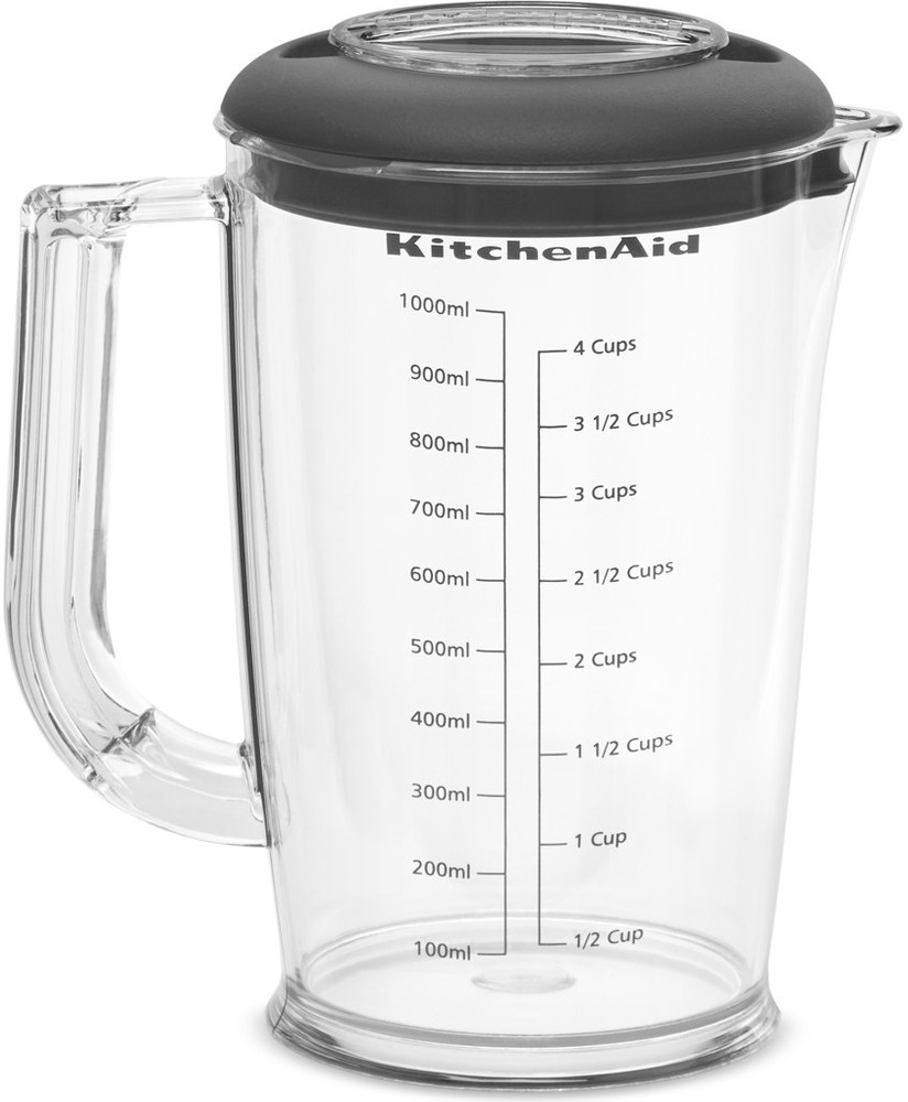 Clear KitchenAid pitcher with measurements in mL and cups, with a black lid and a handle.