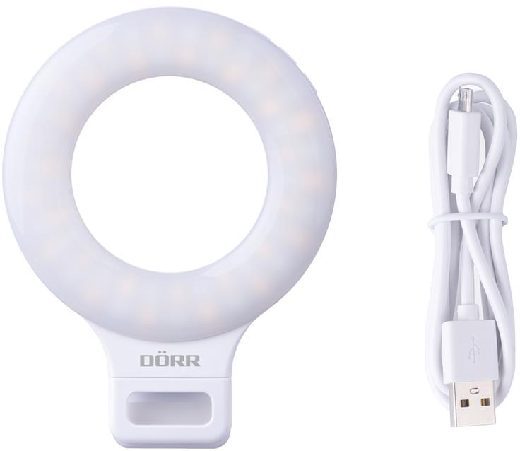 Gyűrűfény fogantyúval. Fehér műanyag, átlátszó középpel. USB kábel a jobb oldalon.