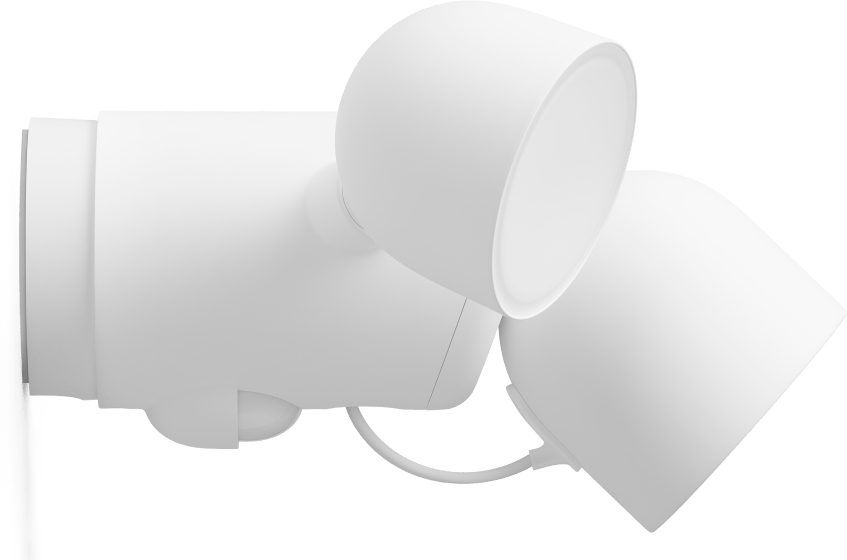 White outdoor floodlights mounted on a wall. Two adjustable lights. Black cable.