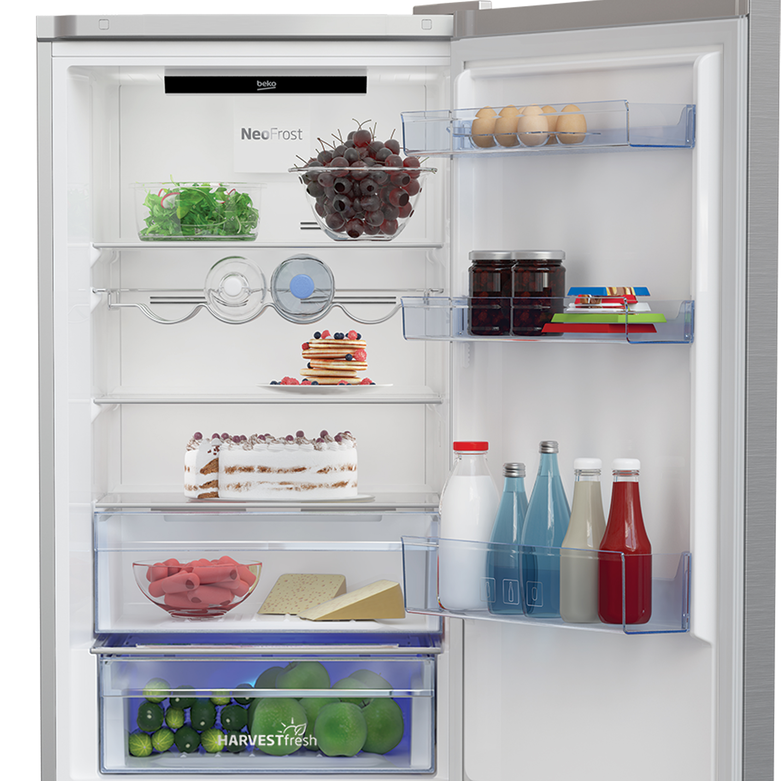 Kühlschrank mit offener Tür. Innen sind Früchte, Gemüse, Eier, Kuchen und Flaschen sichtbar.