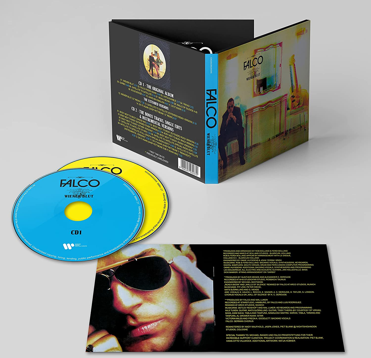 Egy Falco albumborító két CD-vel. Az albumborító egy személyt és egy gitárt ábrázol.