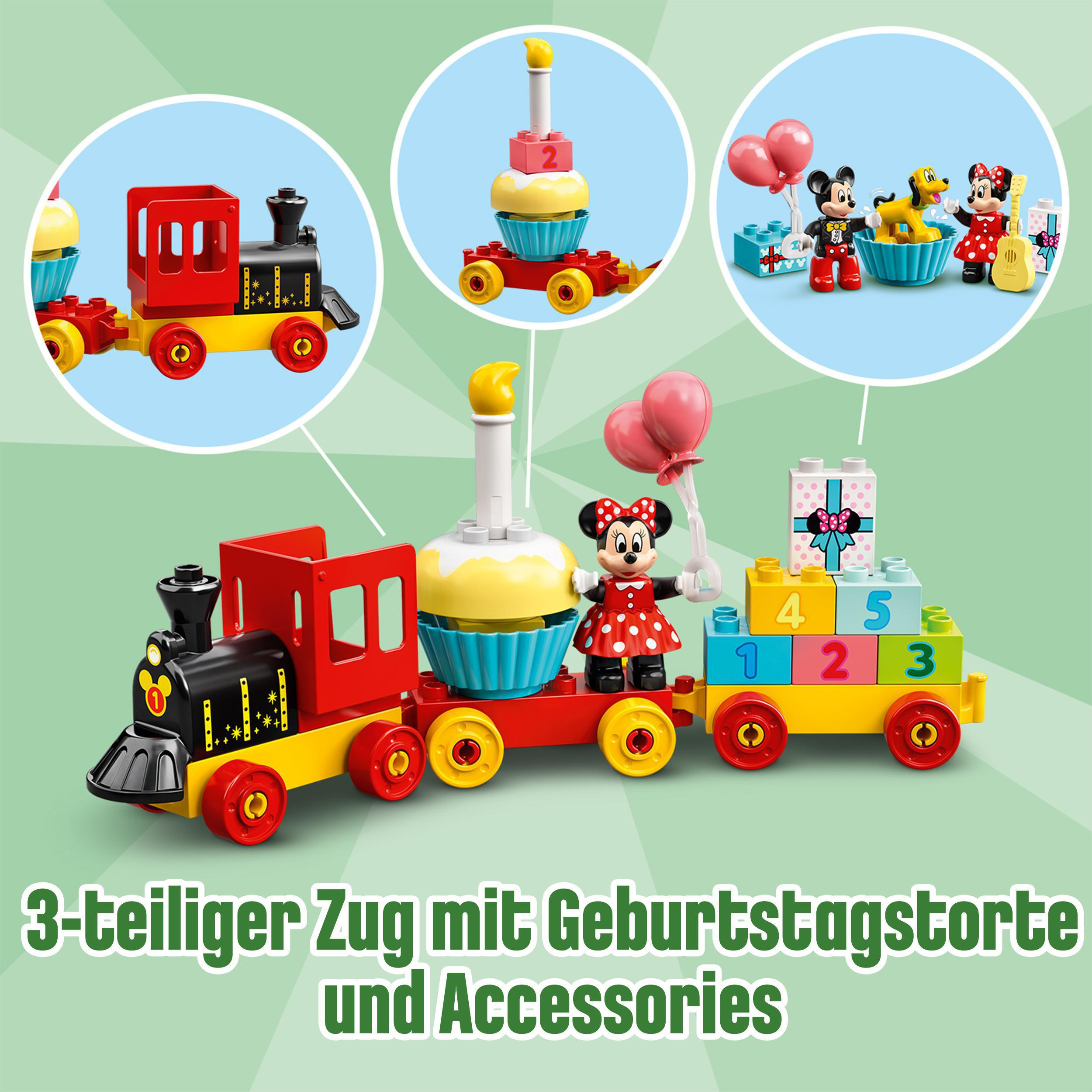 Ein Spielzeugzug mit Duplo-Steinen und Figuren. Text auf Deutsch.