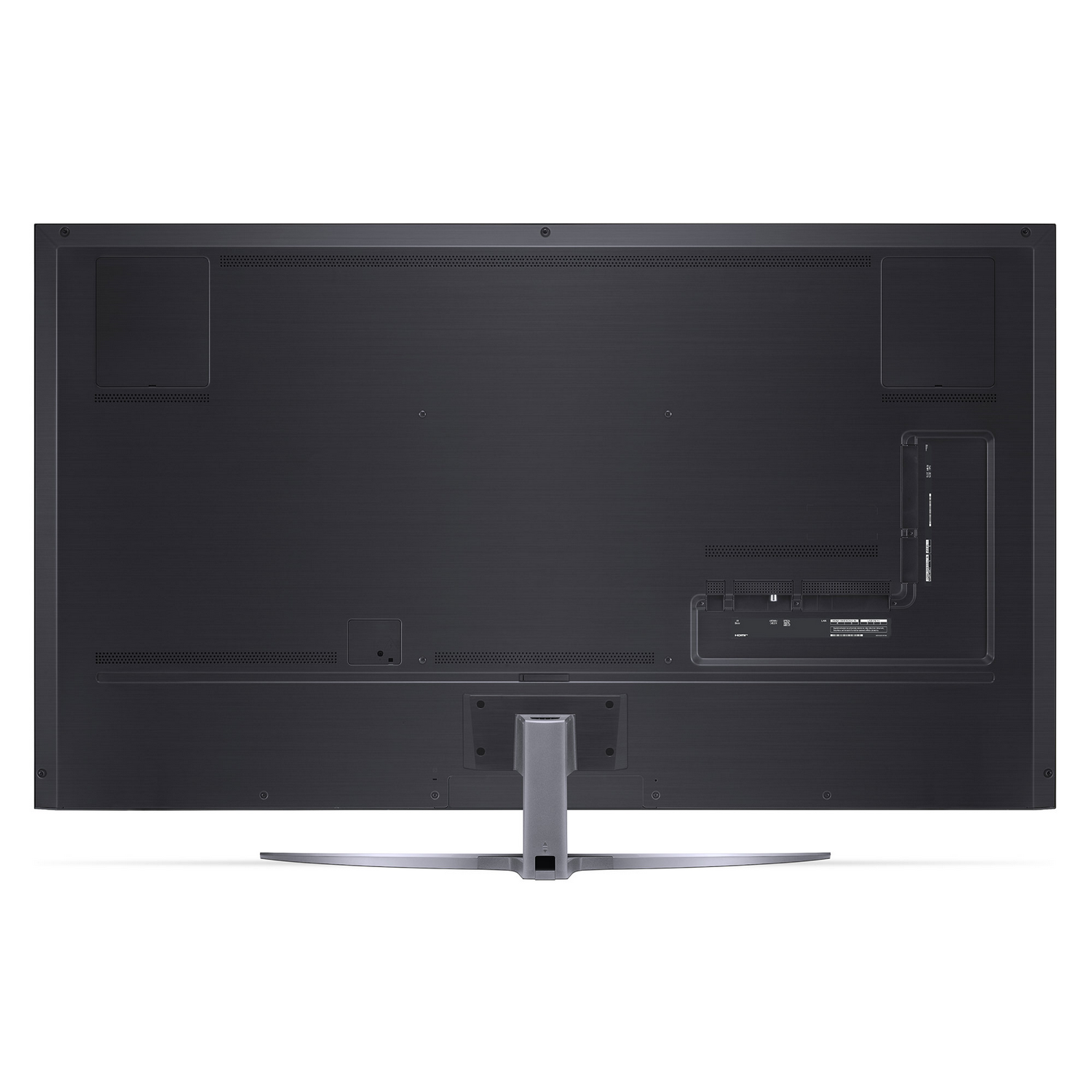 Parte trasera de un televisor negro con puertos y un soporte plateado. La superficie es oscura con rejillas y puertos de conexión.