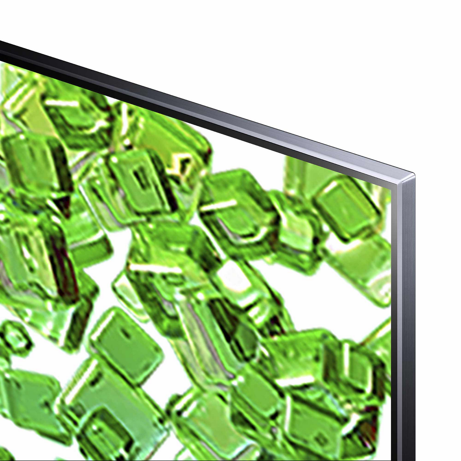 Primer plano de pantalla TV. Muestra patrón de formas cristalinas verdes sobre fondo blanco.