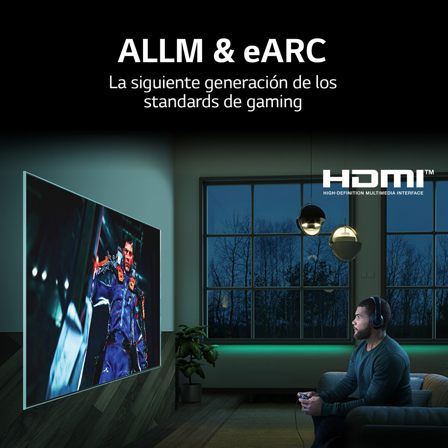 Hombre jugando videojuego en TV grande. Habitación con iluminación tenue y diseño moderno.