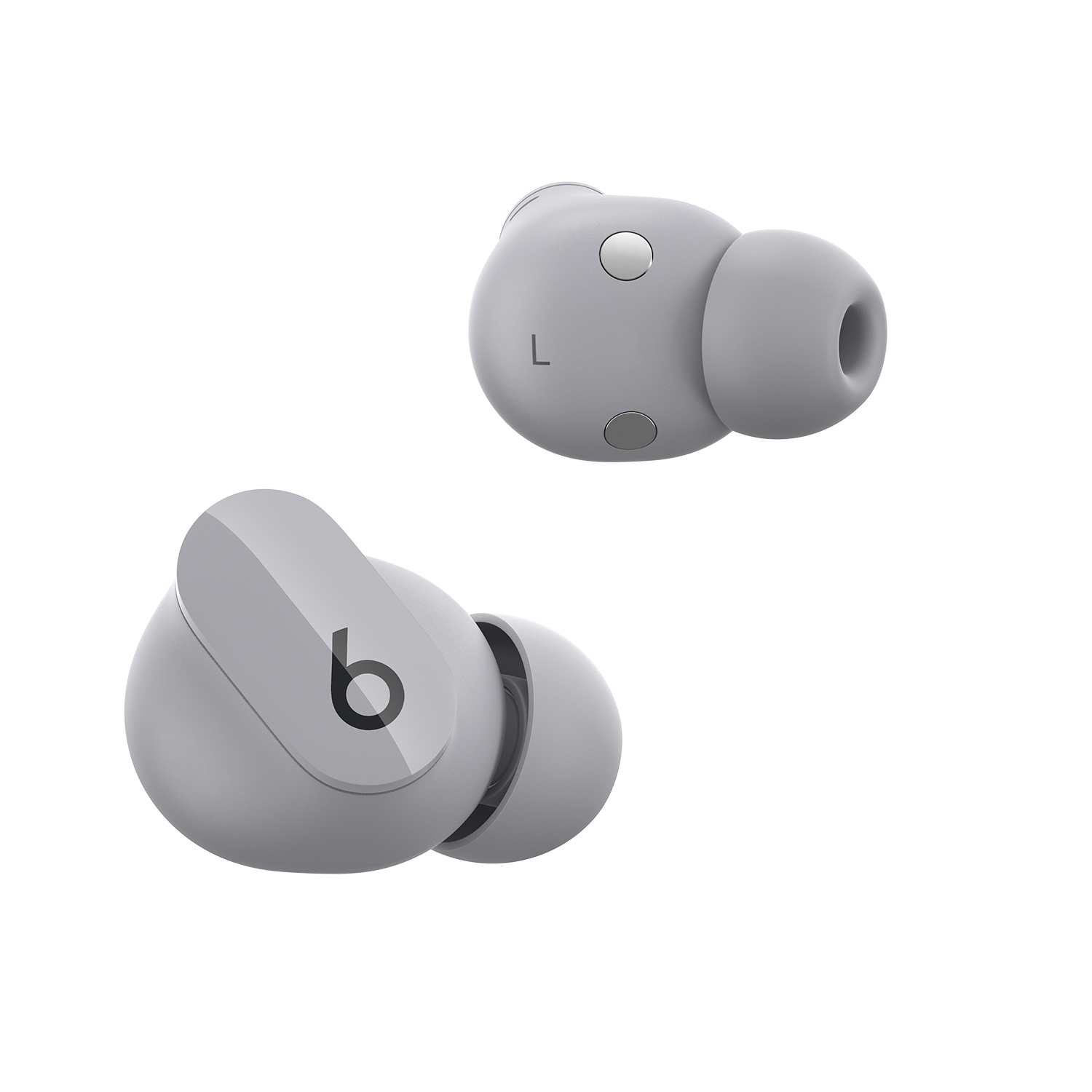 Dos auriculares Beats grises sobre fondo negro. Uno muestra una 'L'.