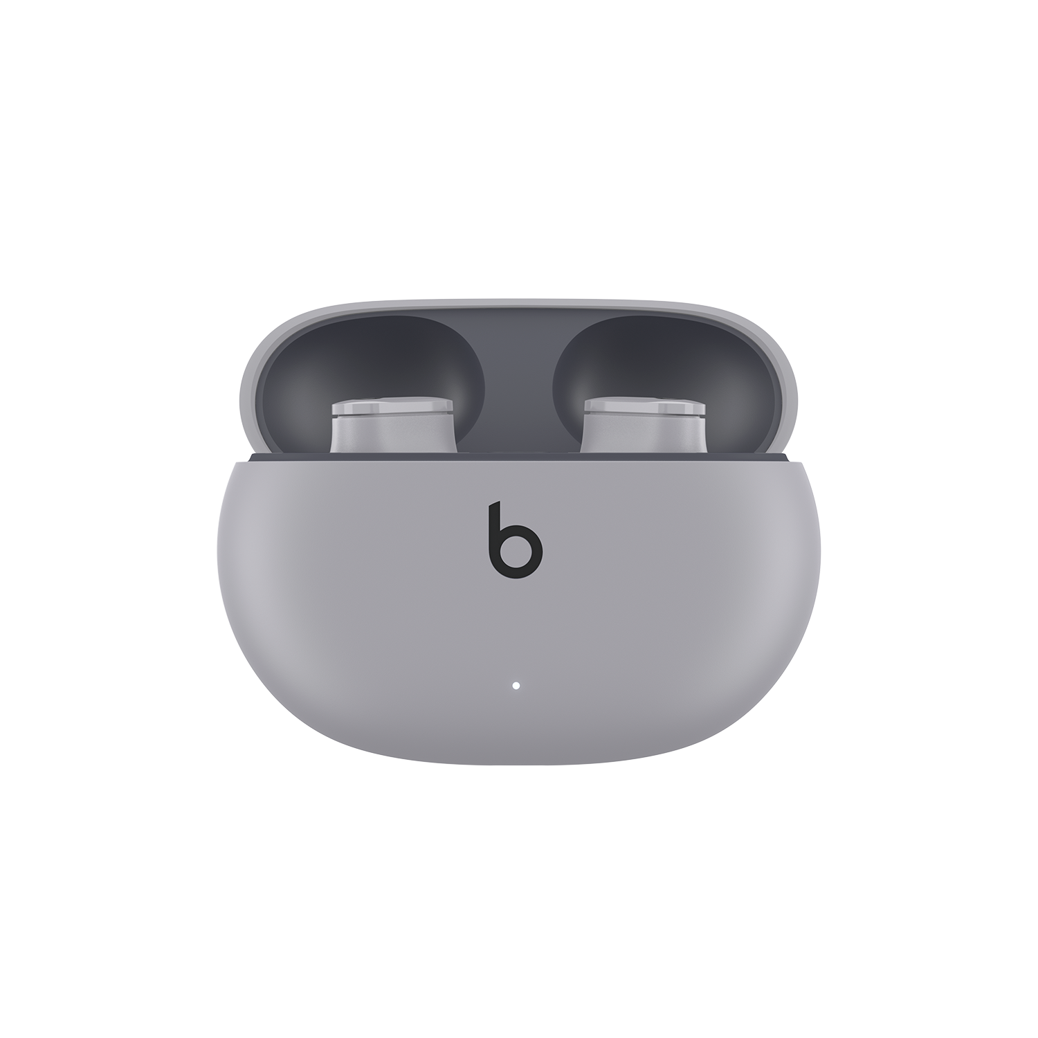 Auriculares Beats grises en un estuche de carga, abiertos, con el logotipo de Beats visible.