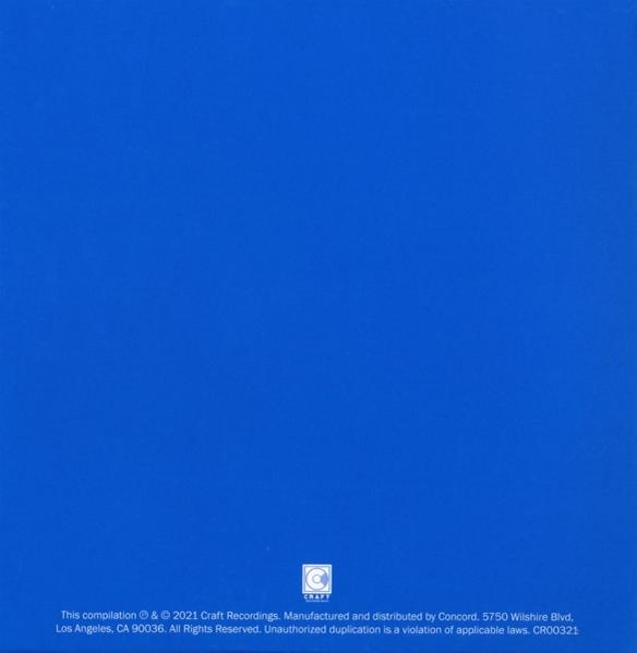 Blauwe achtergrond met tekst onderaan: copyright- en fabricage-informatie.