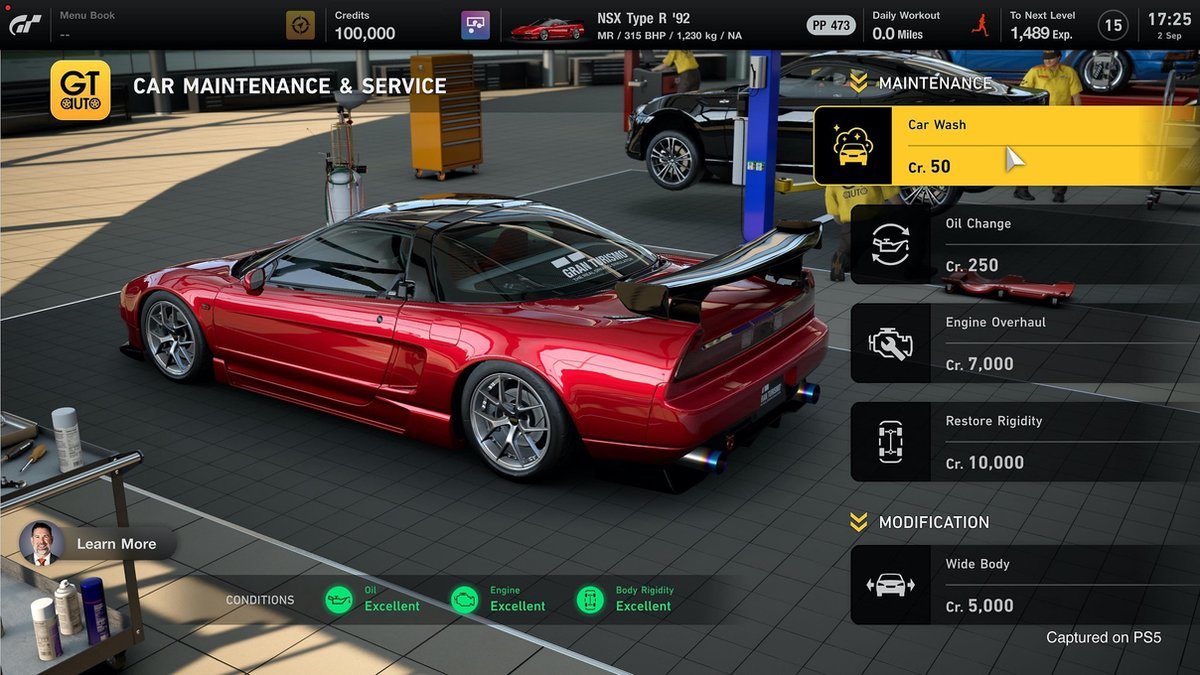 Screenshot from Gran Turismo game, showing car maintenance options. Includes a red sports car.