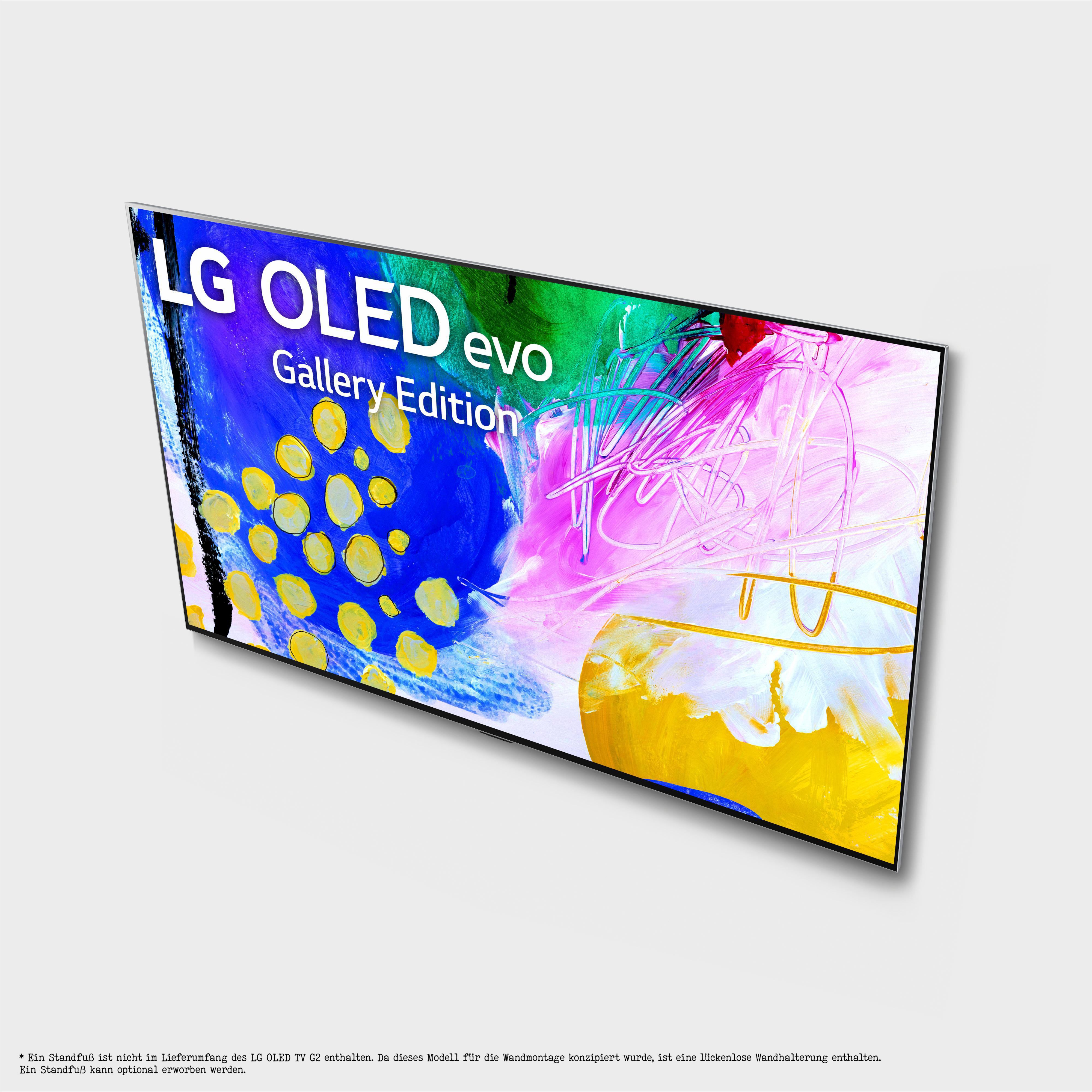 LG OLED evo Gallery Edition Fernseher mit farbenfroher abstrakter Kunst auf weißem Hintergrund.
