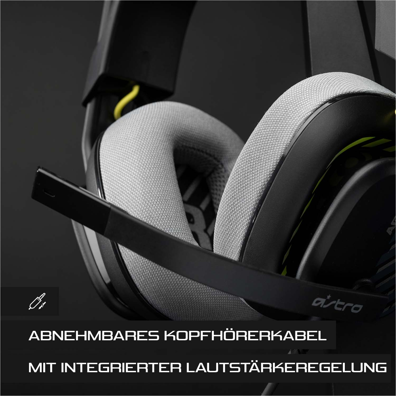 Ein schwarzes und graues Gaming-Headset mit Mikrofon. Text: Abnehmbares Kopfhörerkabel.