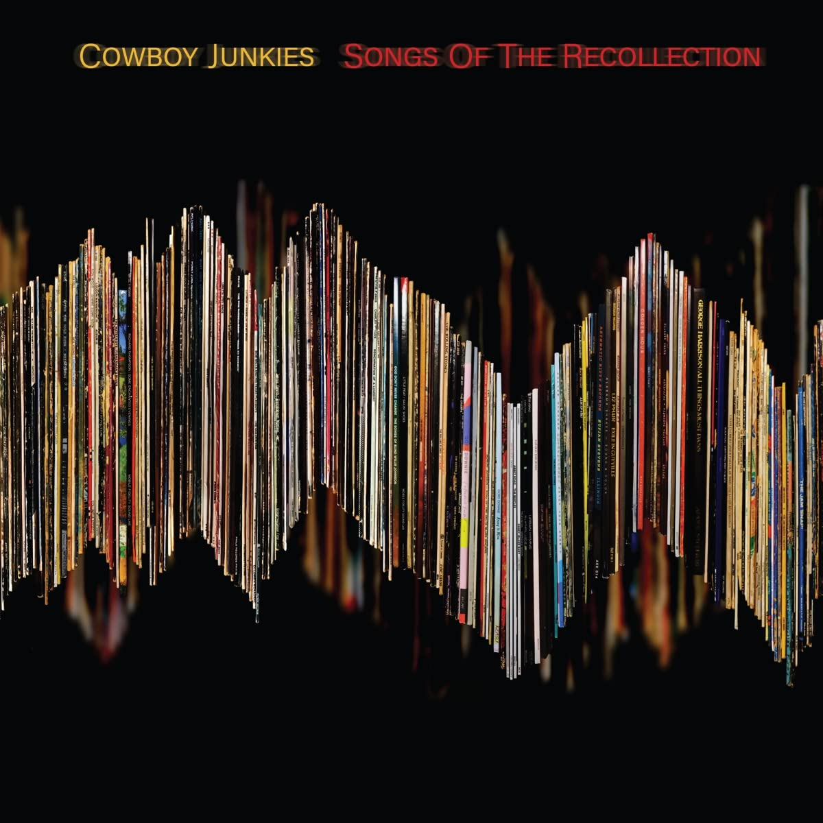 Album borító fekete háttérrel és színes függőleges vonalakkal, a zenekar a COWBOY JUNKIES.