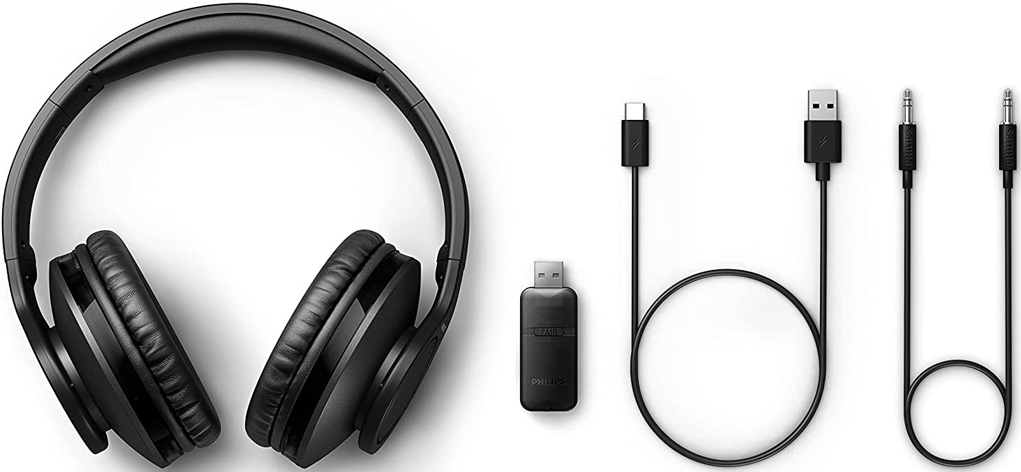 Casque Philips noir, câbles USB-C et USB, un récepteur USB et un câble 3,5 mm sur fond blanc.