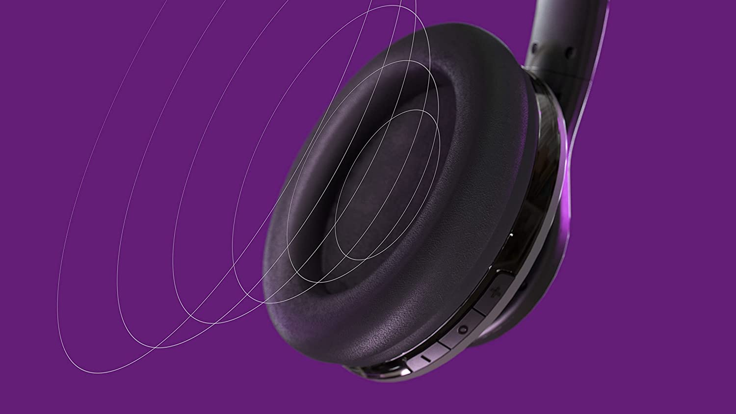 Gros plan sur un casque noir avec des graphiques d'ondes sonores sur fond violet.