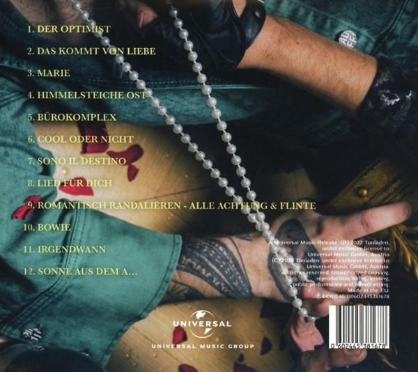 Albumcover mit Titelliste auf Deutsch, Hand mit Perlenkette.
