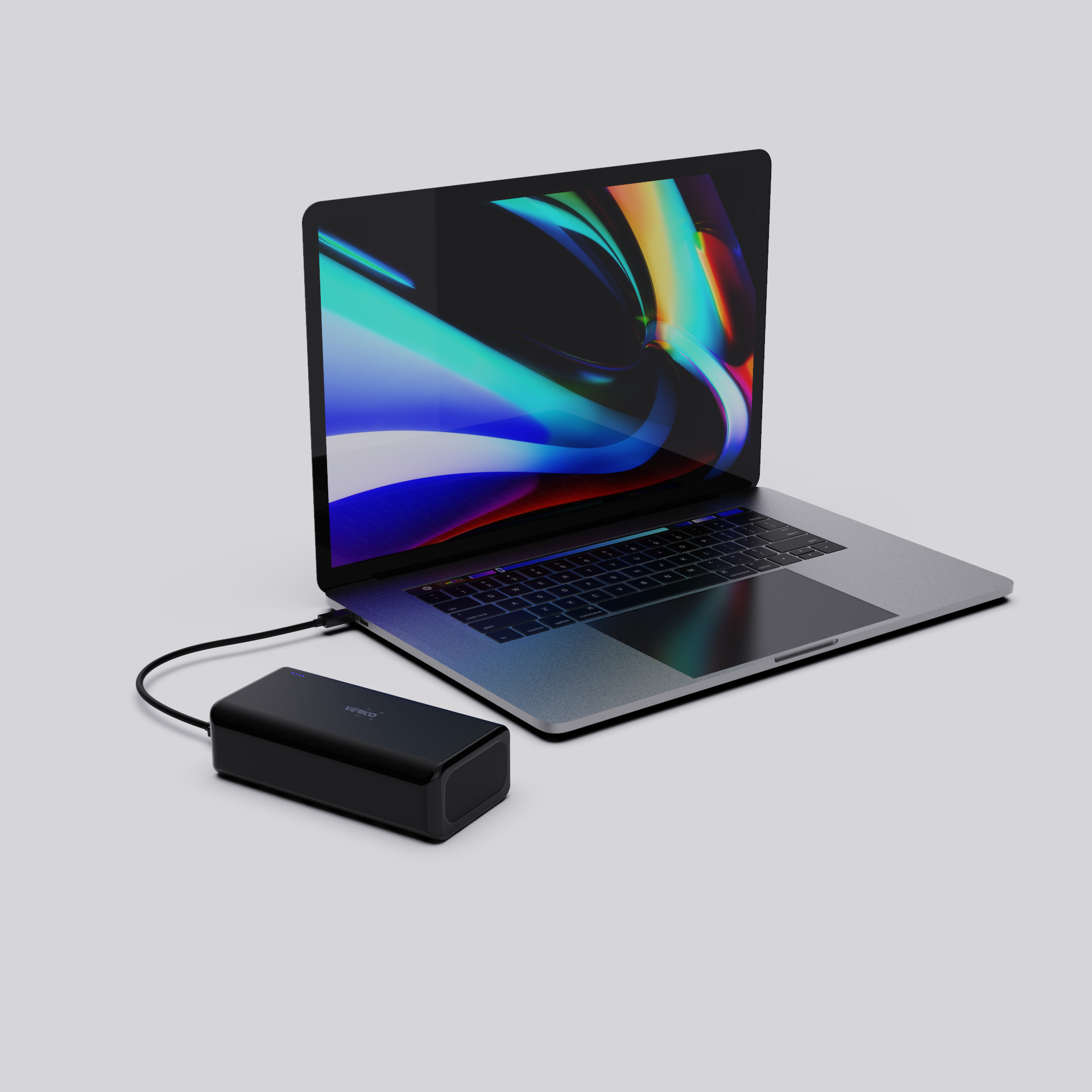Ein schwarzer Laptop mit einem angeschlossenen schwarzen Ladegerät.