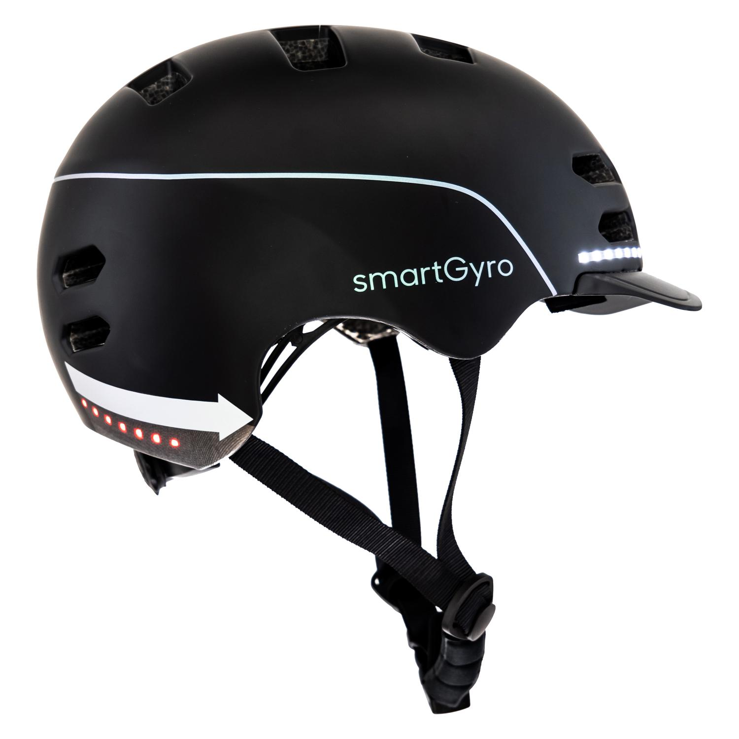 Casco de bicicleta negro con luces. Flechas y líneas blancas, fondo blanco.