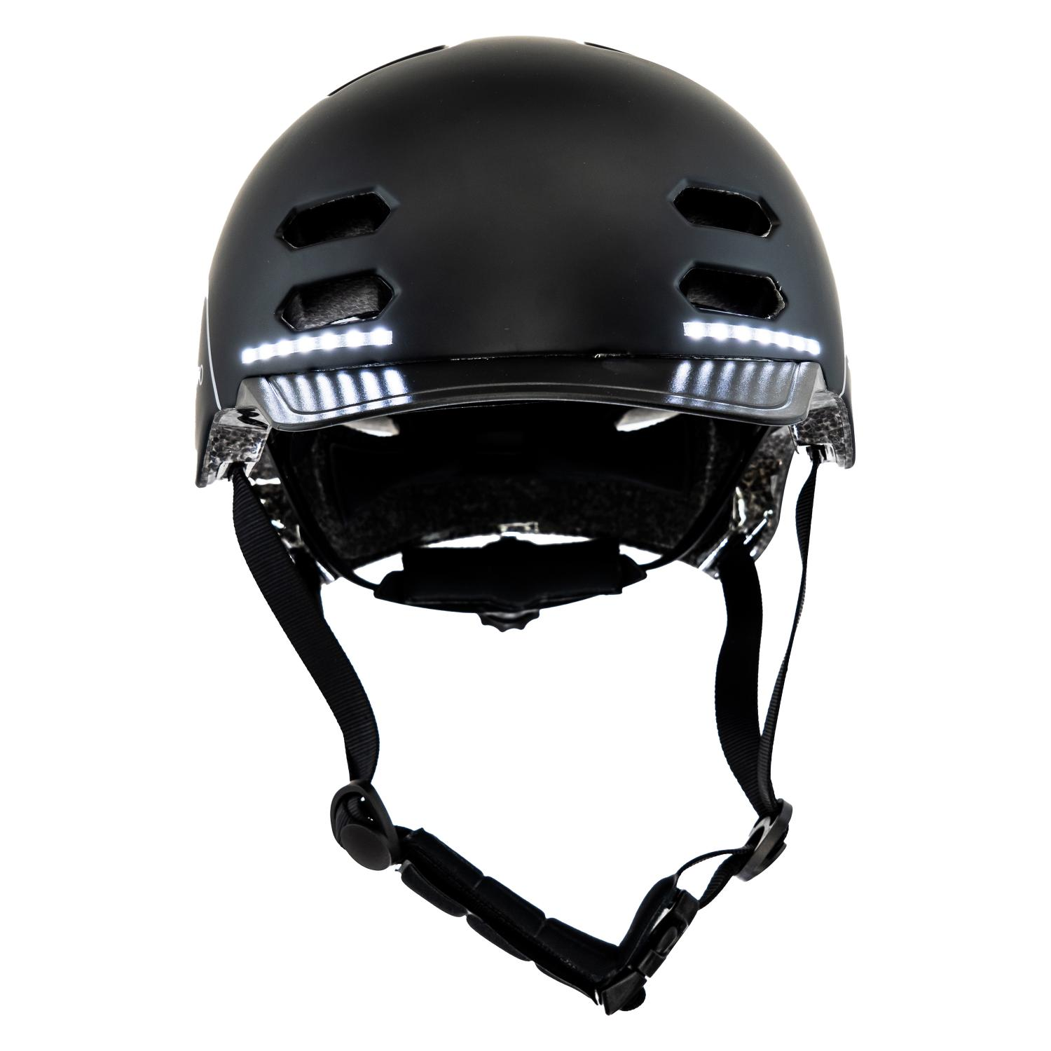 Un casco de bicicleta negro con luces blancas en la parte superior.