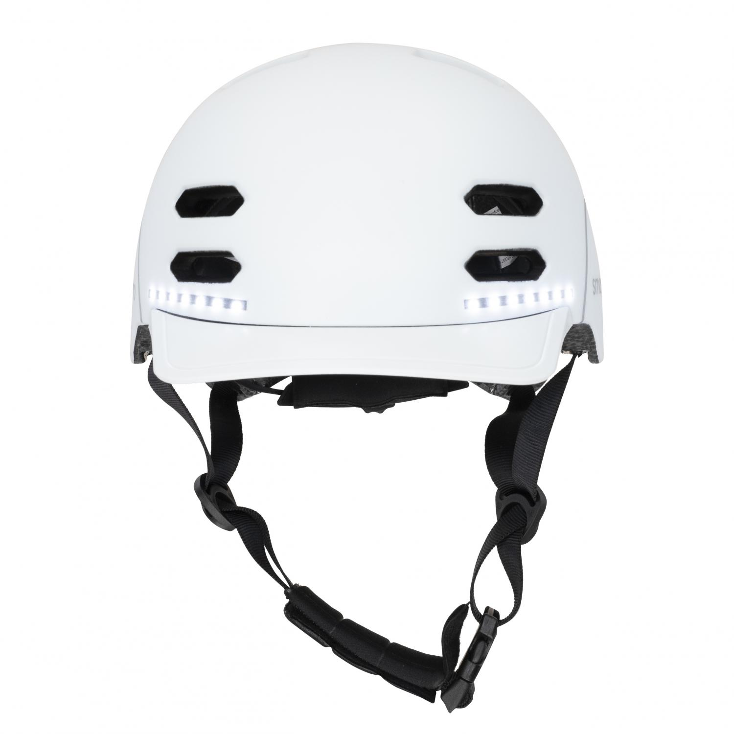 Casco de bicicleta blanco con luces y correas ajustables.