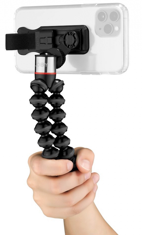 Black and red flexible tripod holds a phone. The phone is white with a clear case.