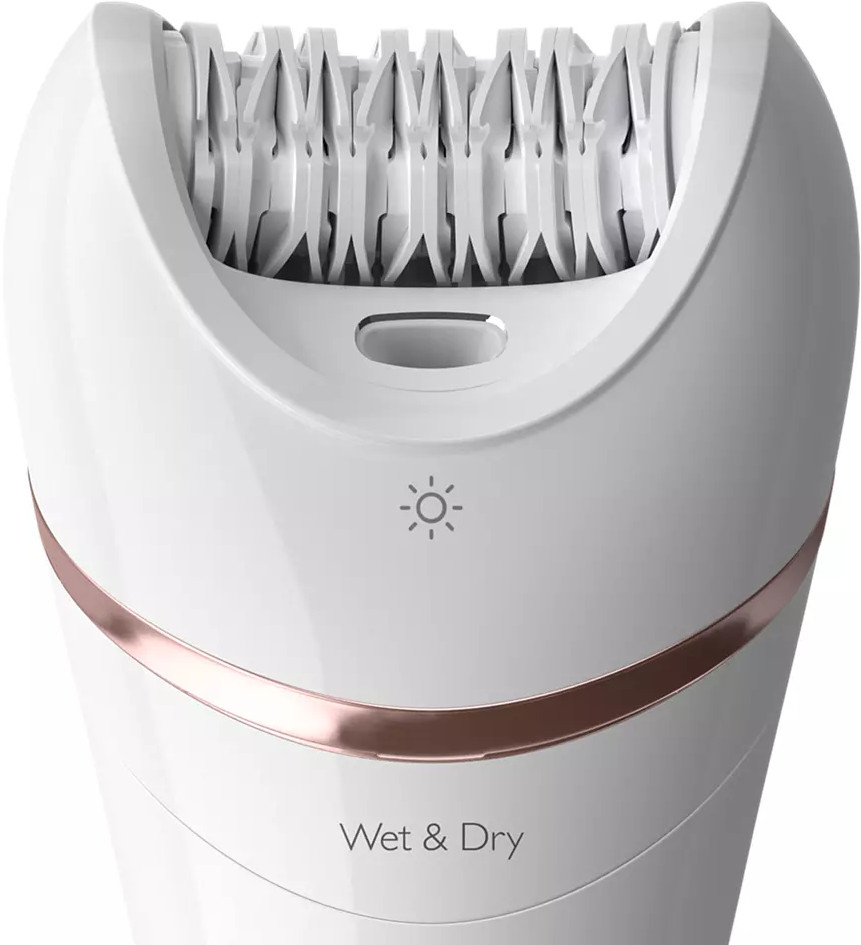 White and rose gold epilator with the head open. It says "Wet & Dry" on it.