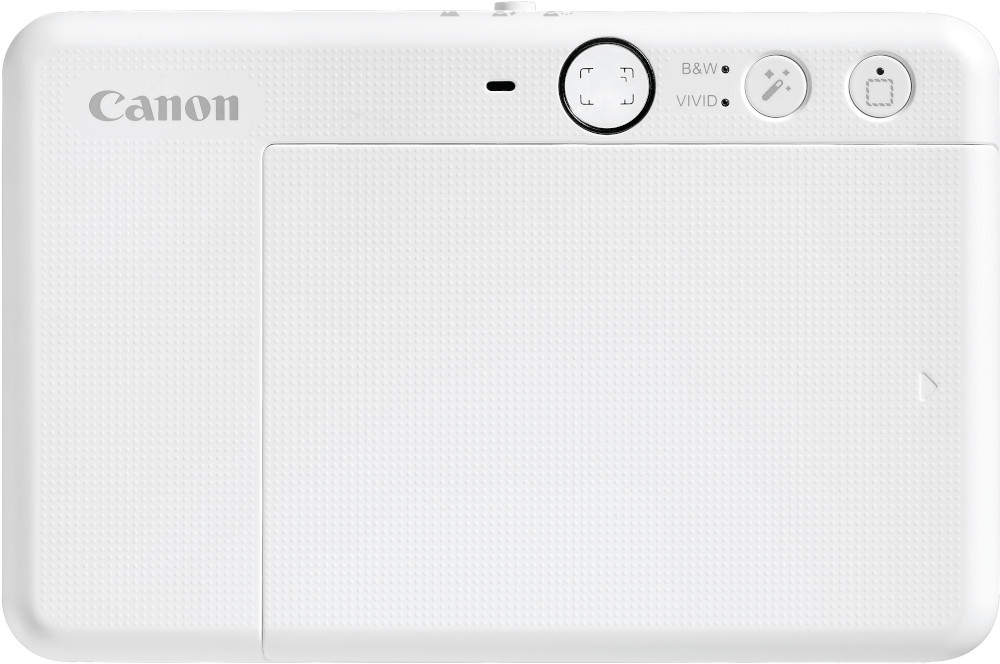White Canon printer with buttons on top.