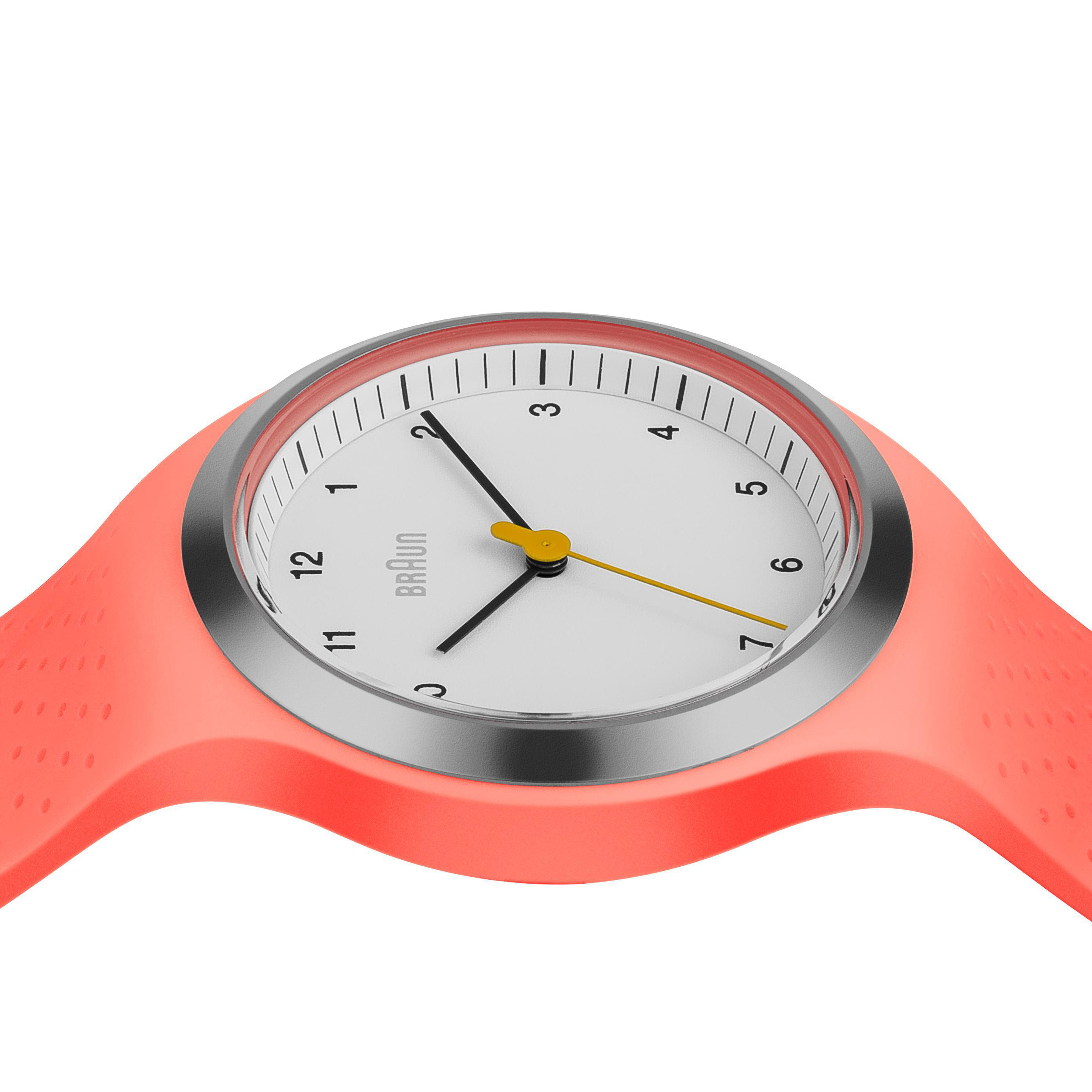 Eine Uhr mit weißem Zifferblatt und gelbem Zeiger, platziert auf einem korallenfarbenen Armband.