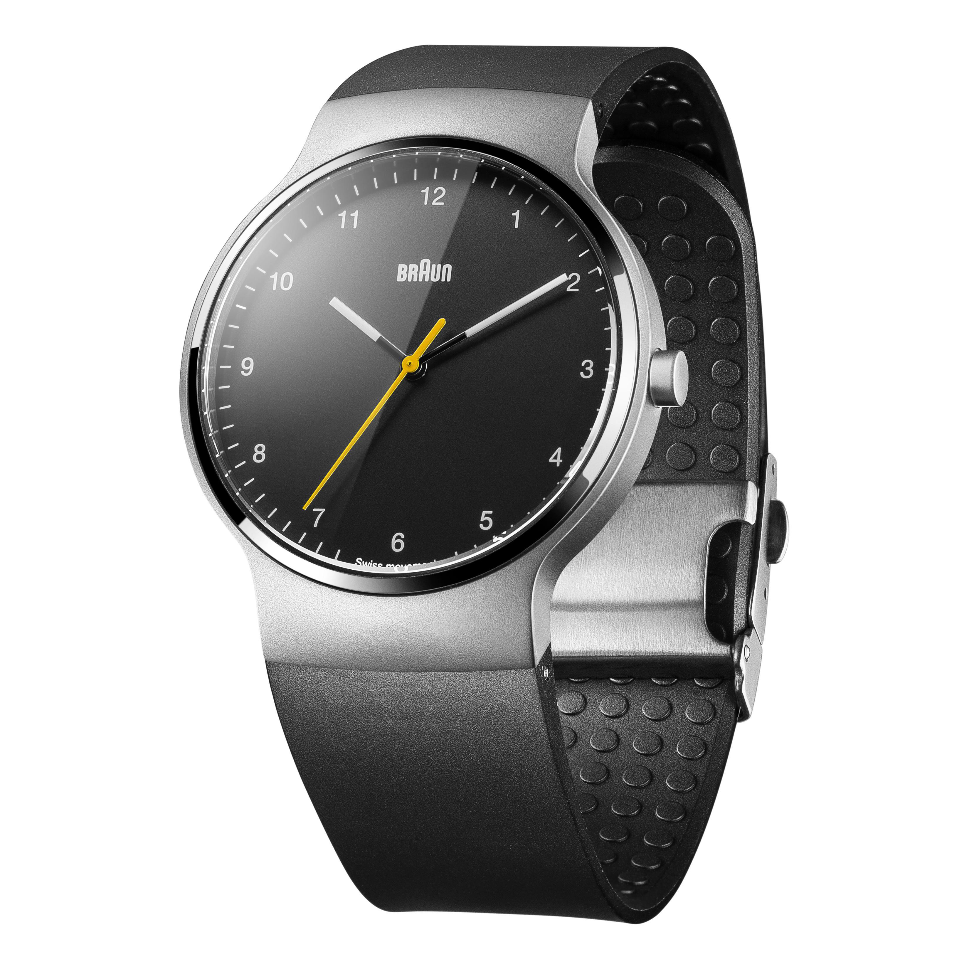 Braun-Uhr mit schwarzem Zifferblatt. Silberner Rahmen mit gelbem Sekundenzeiger und schwarzem Band.
