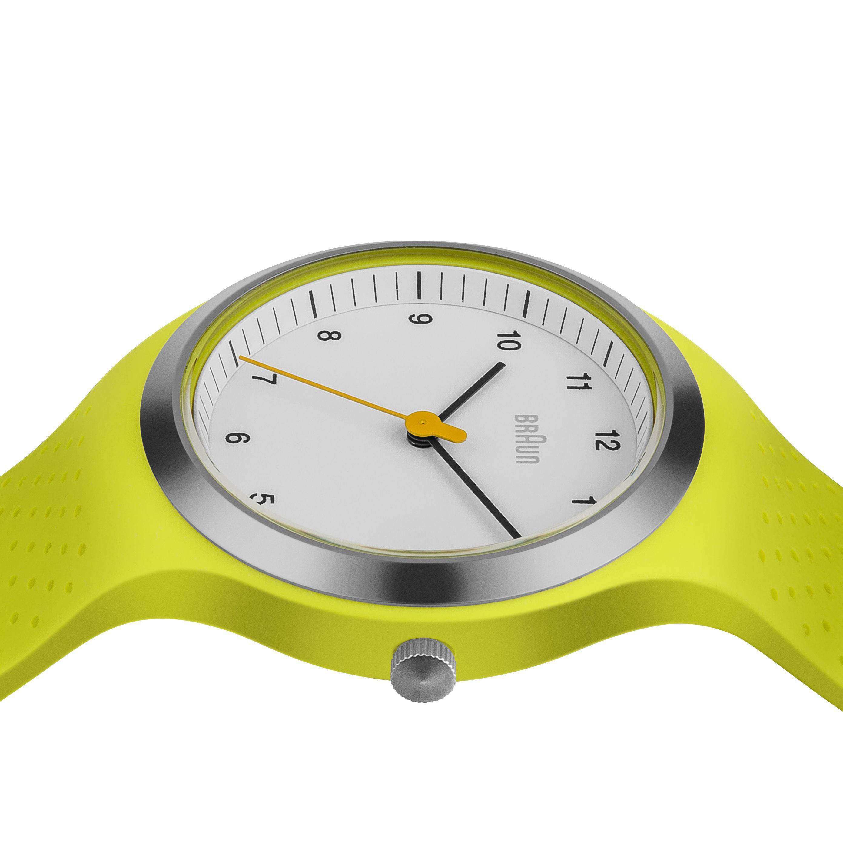 Gelbe Braun-Uhr mit weißem Zifferblatt, schwarzen Zeigern und gelbem Armband.