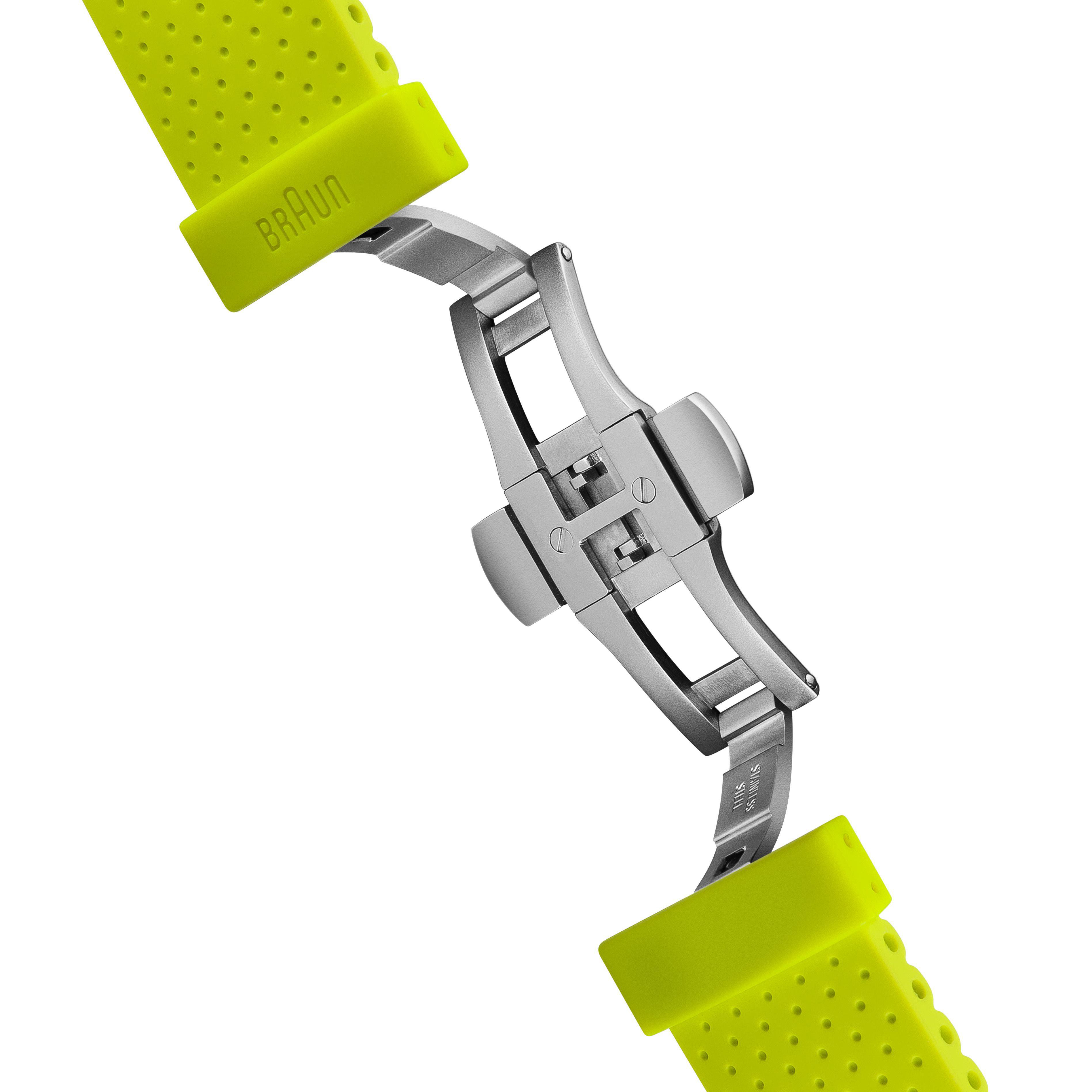 Gelbes Uhrenarmband mit silberner Schnalle. Der Markenname "BRAUN" ist sichtbar.