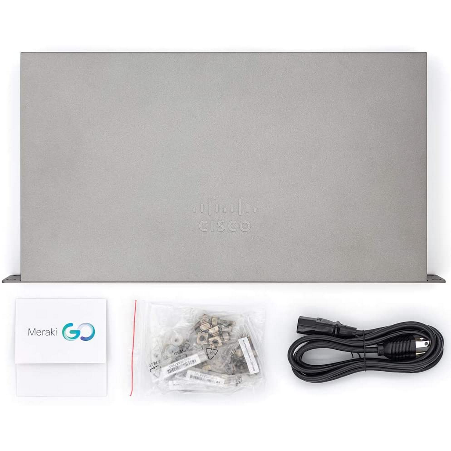Un dispositivo de red Cisco Meraki Go gris con accesorios, visto desde arriba.