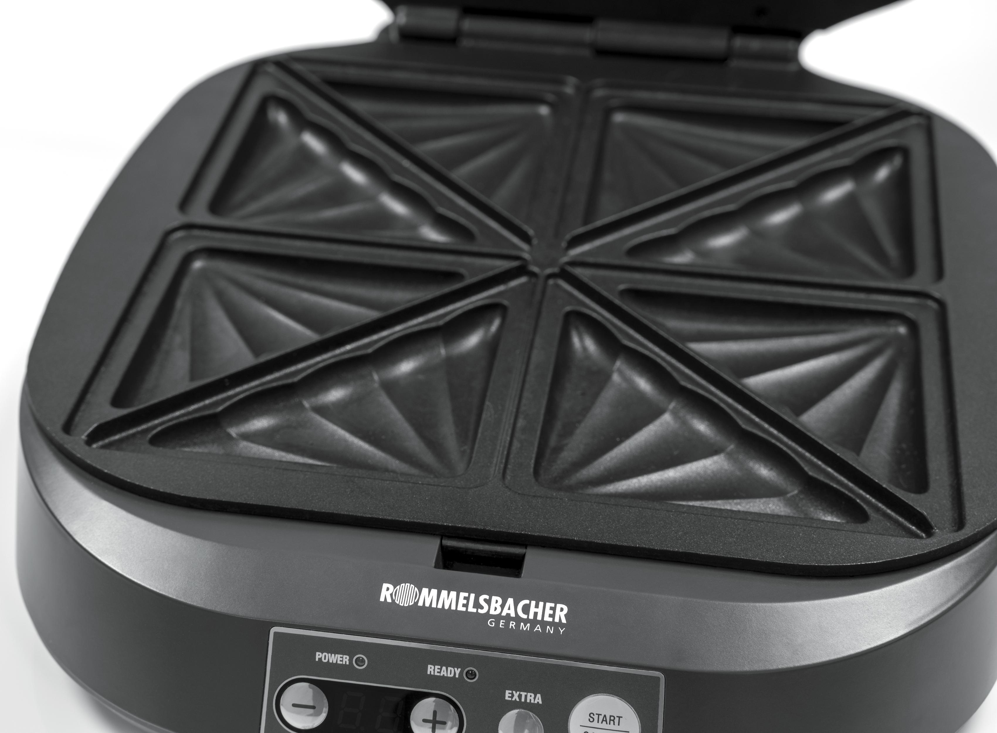 Ein schwarzes Waffeleisen mit vier dreieckigen Kochflächen.