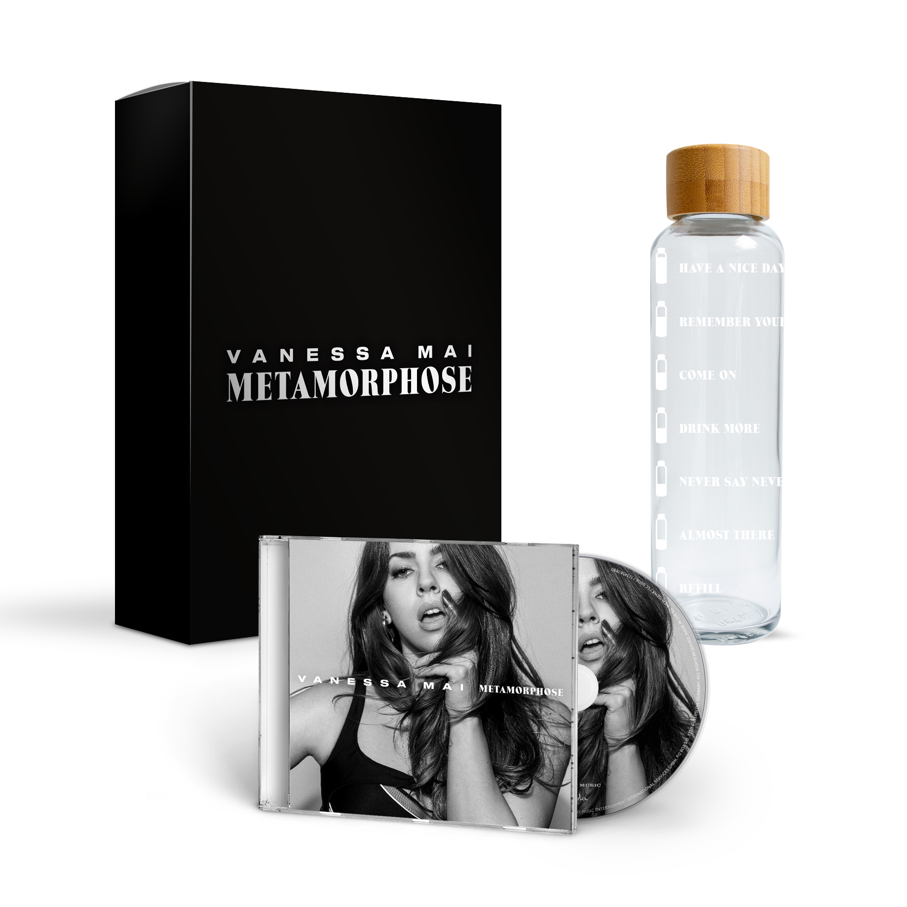 Eine schwarze Box, CD und Wasserflasche mit Text zum Album 'Metamorphose'.