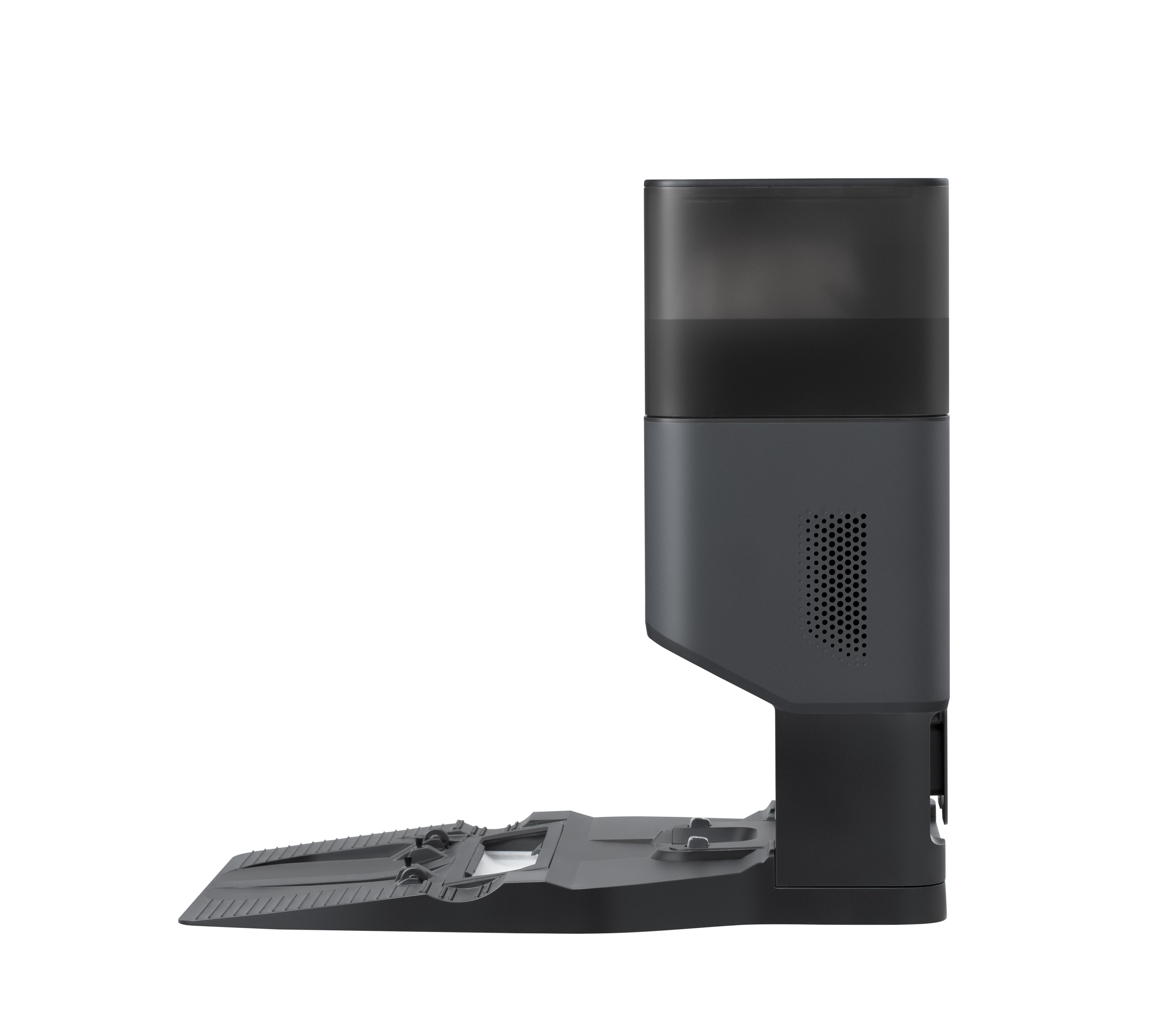 Eine schwarze Ladestation für einen Roboter-Staubsauger. Die Ladestation befindet sich auf weißem Hintergrund.