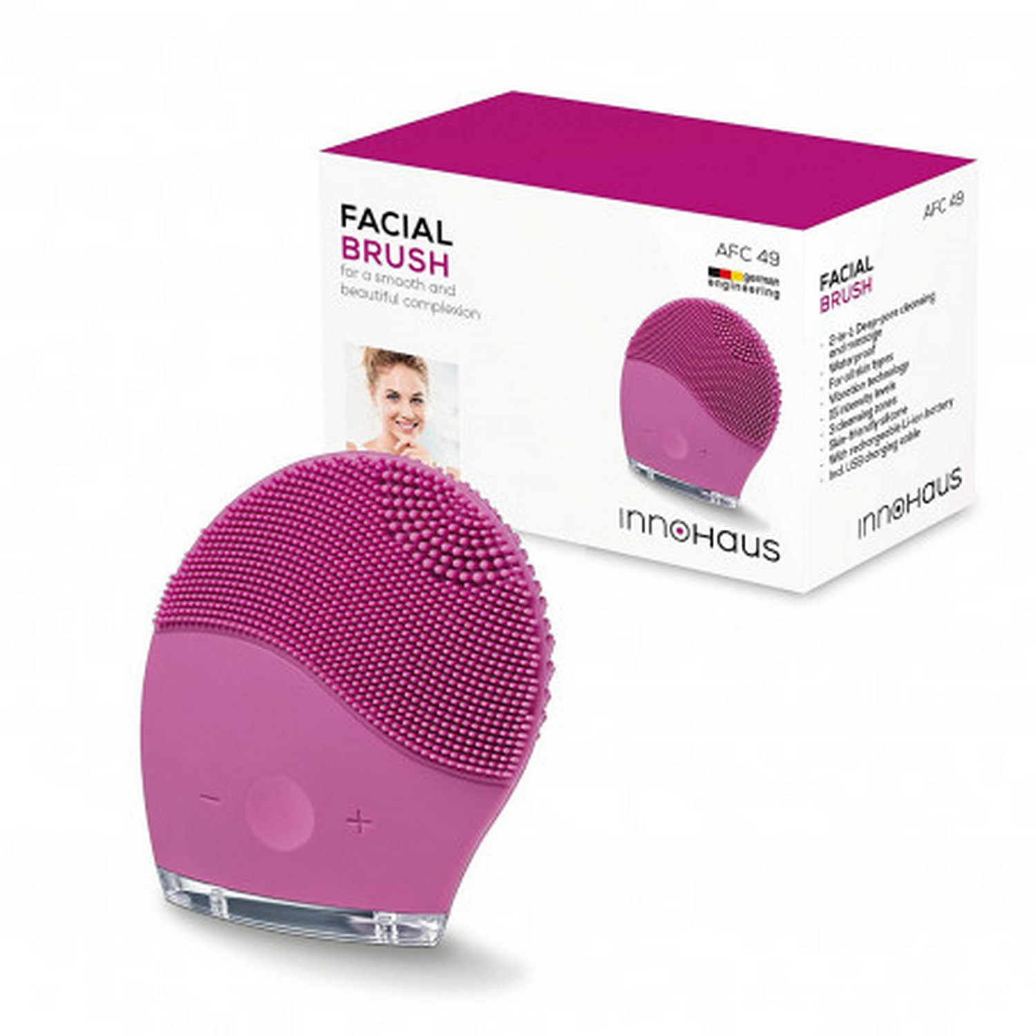 Cepillo facial rosa y caja. Cepillo tiene cerdas. La caja muestra el cepillo y la cara de una mujer.