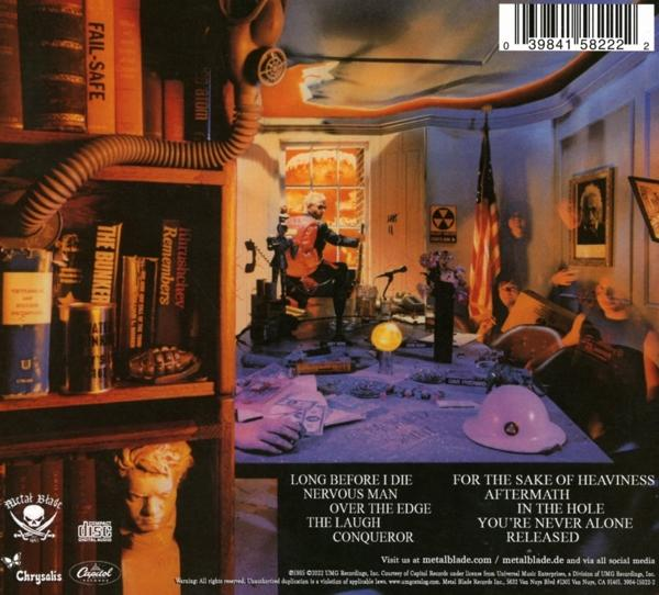 Albumcover. Ein Mann mit Gasmaske steht in einem Raum mit zerstörter Welt draußen.