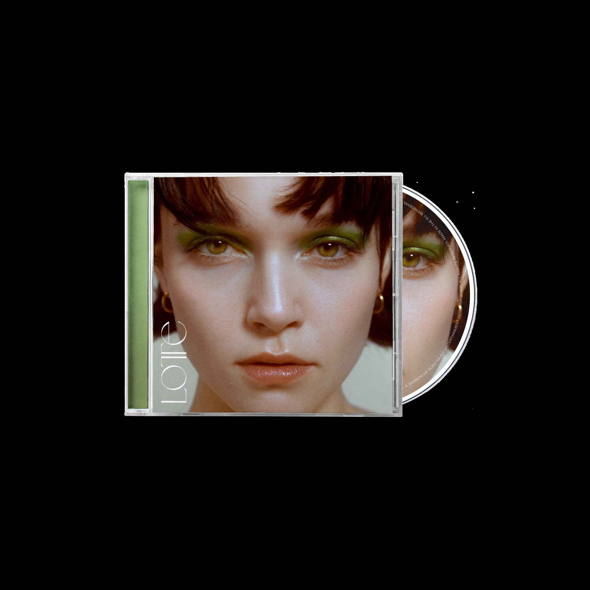 CD-Hülle mit dem Gesicht einer Frau auf dem Cover. Grüner Lidschatten und goldene Ohrringe sind sichtbar.