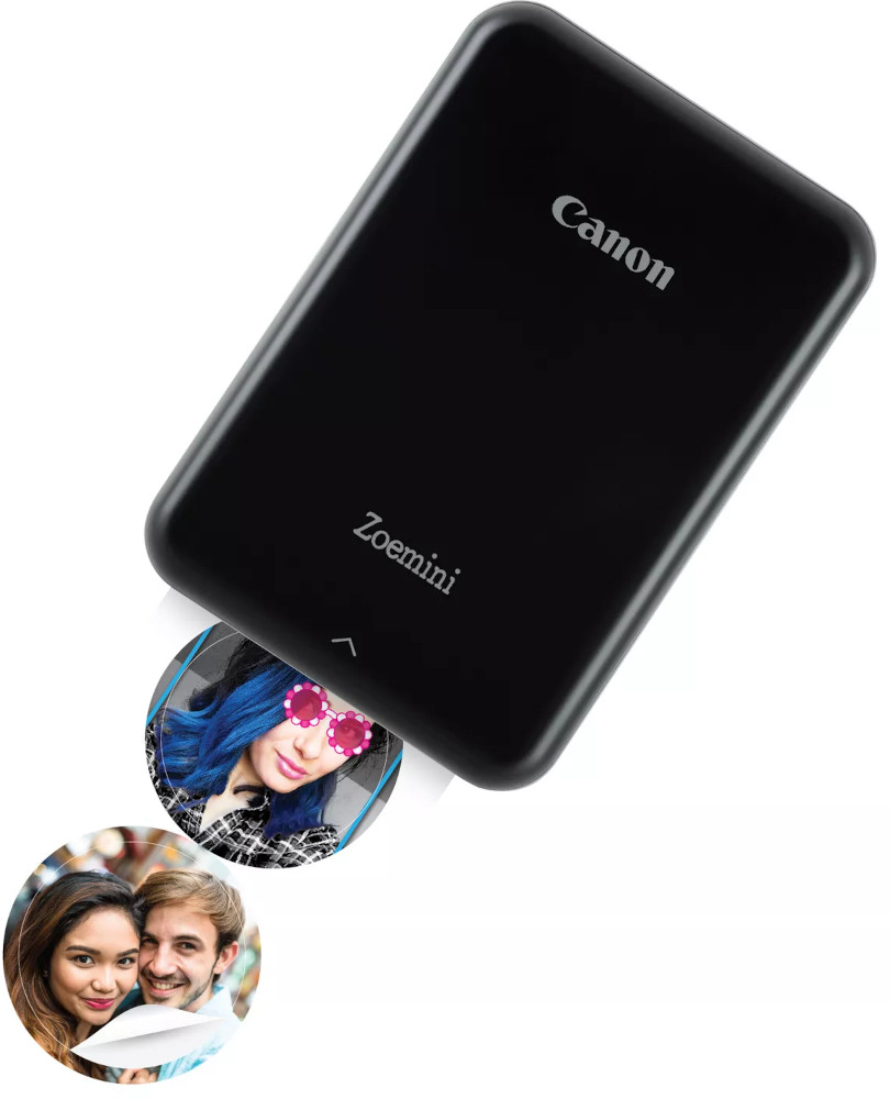 A Canon Zoemini black portable printer prints a photo with a woman.