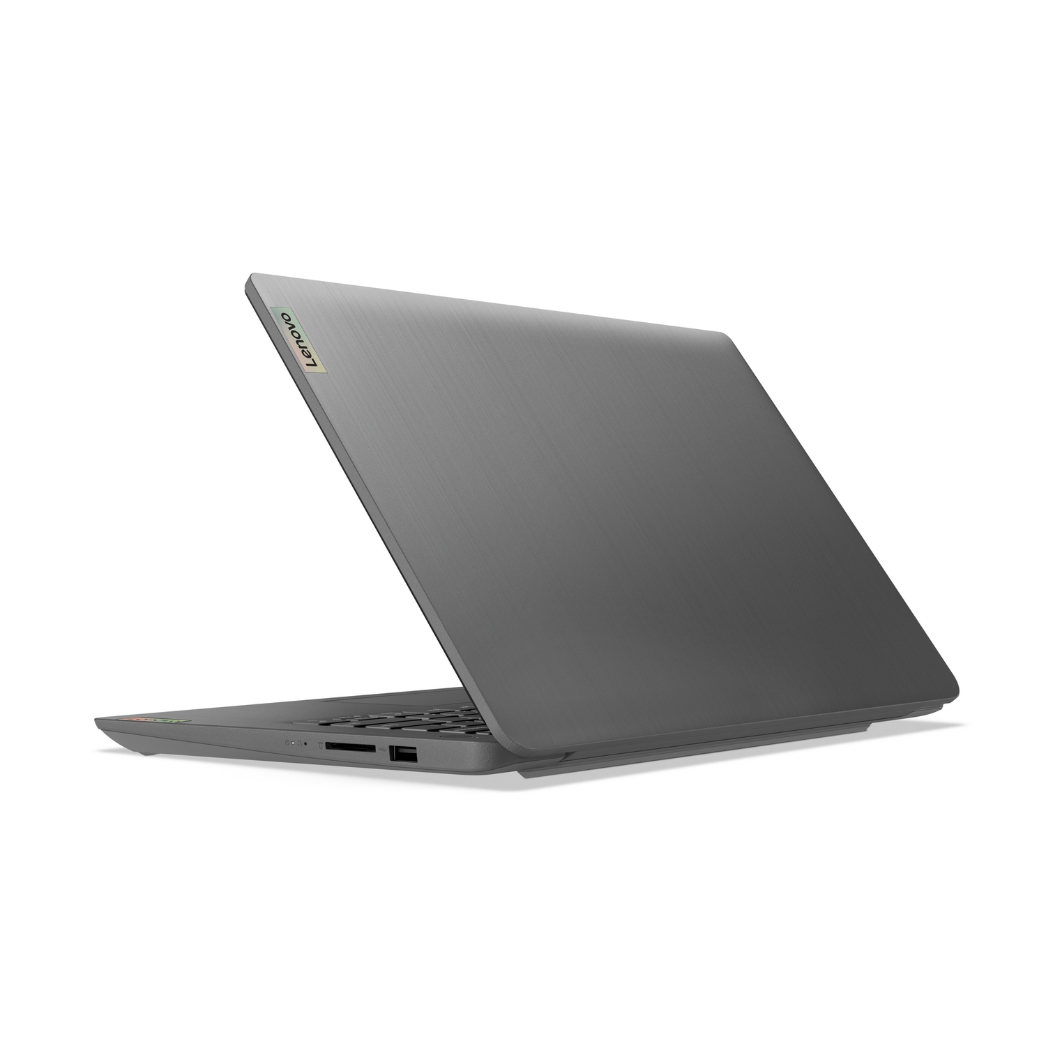 Un portátil Lenovo gris, abierto en ángulo, revela el teclado y los puertos. El fondo es blanco.