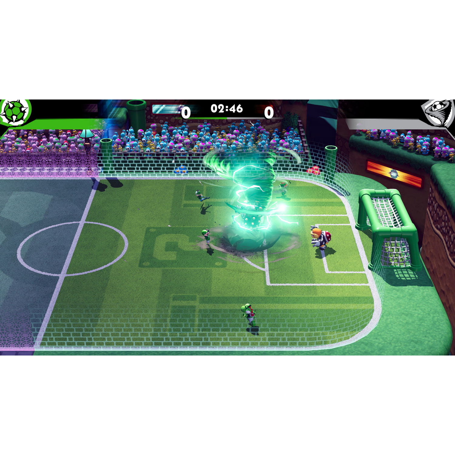 Un partido de fútbol con jugadores, un campo verde y una portería.