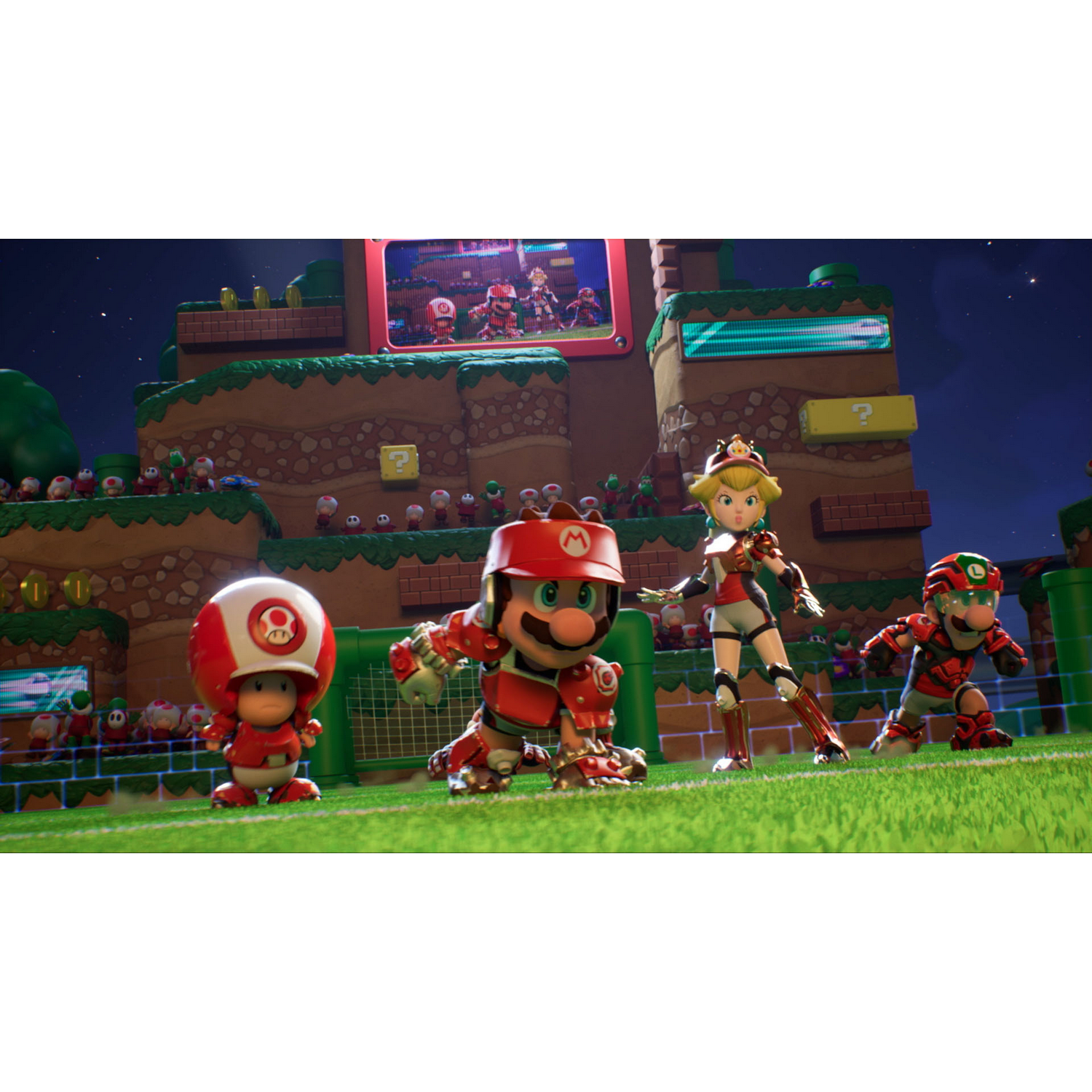 Personajes de Mario en un partido de fútbol. Mario, Luigi, Peach y Toad con uniformes rojos en un campo verde.