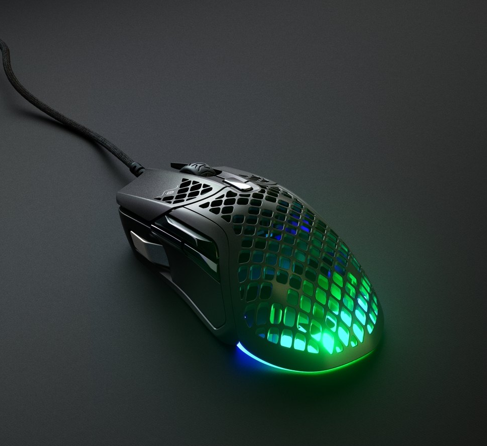 Mouse da gioco, nero con illuminazione verde e blu. Presenta un design a nido d'ape.