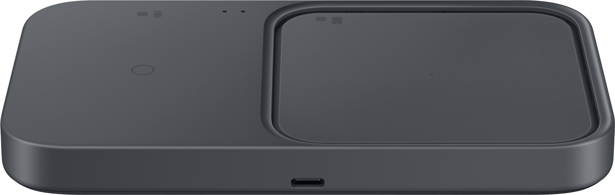 A dark gray wireless charging pad with two charging areas and a USB-C port.