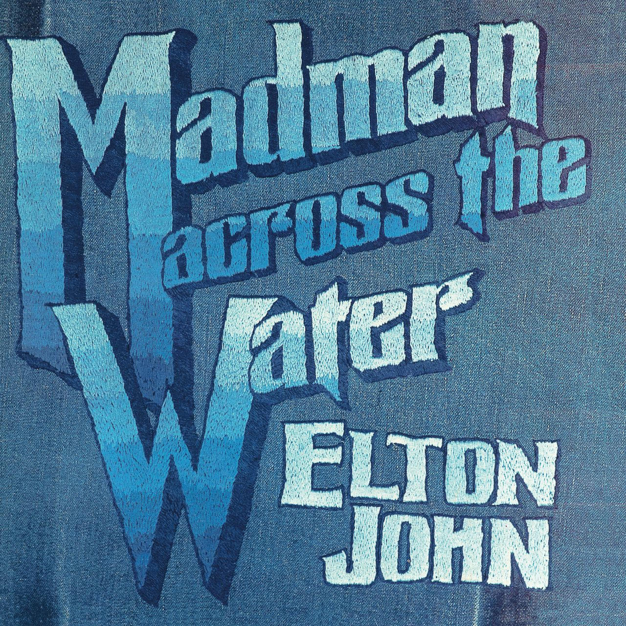 Elton John albumhoes: Geborduurde blauwe tekst op denim. Titel: Madman Across the Water.