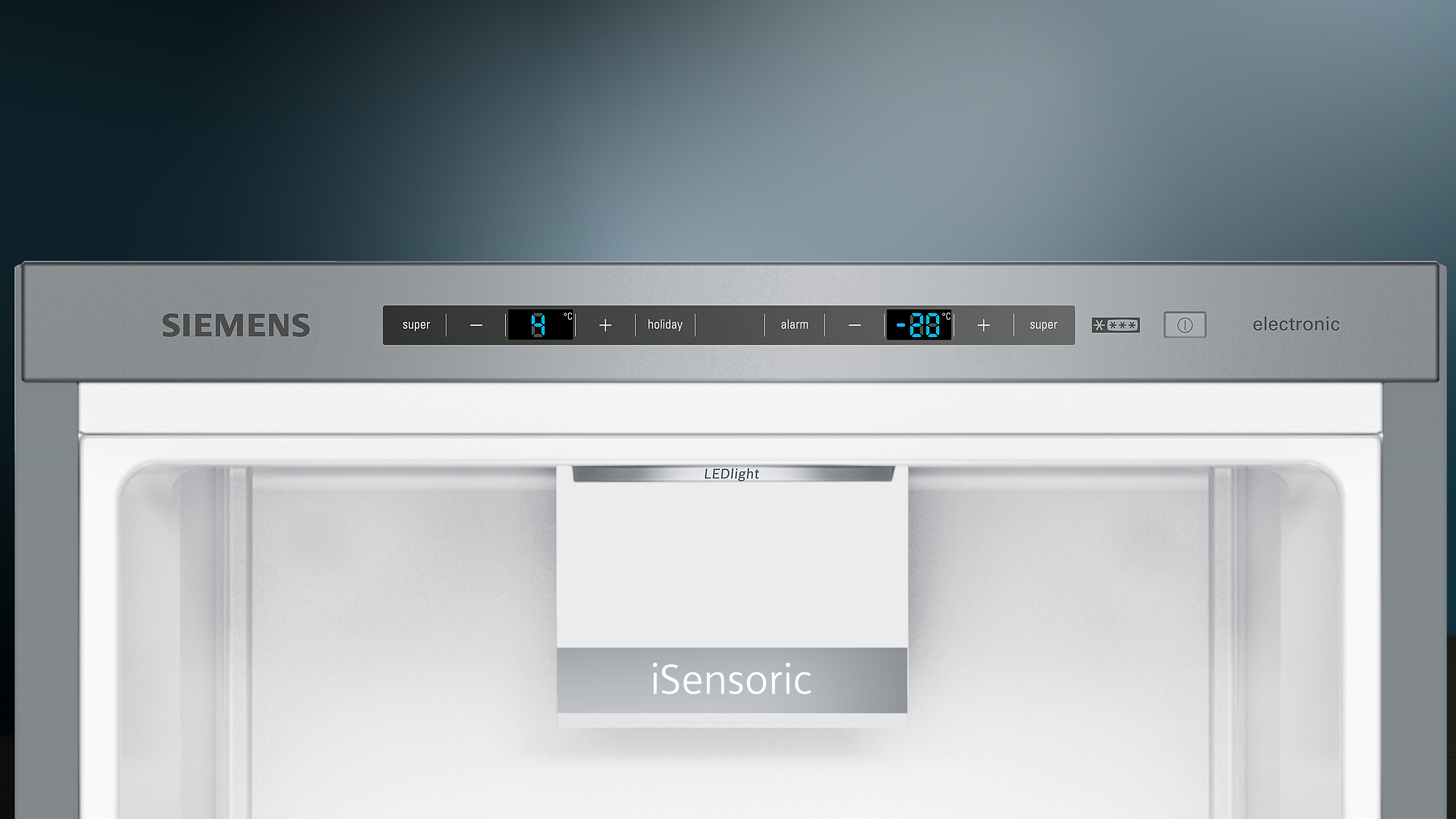 Close-up of a refrigerator control panel. Displays numbers.