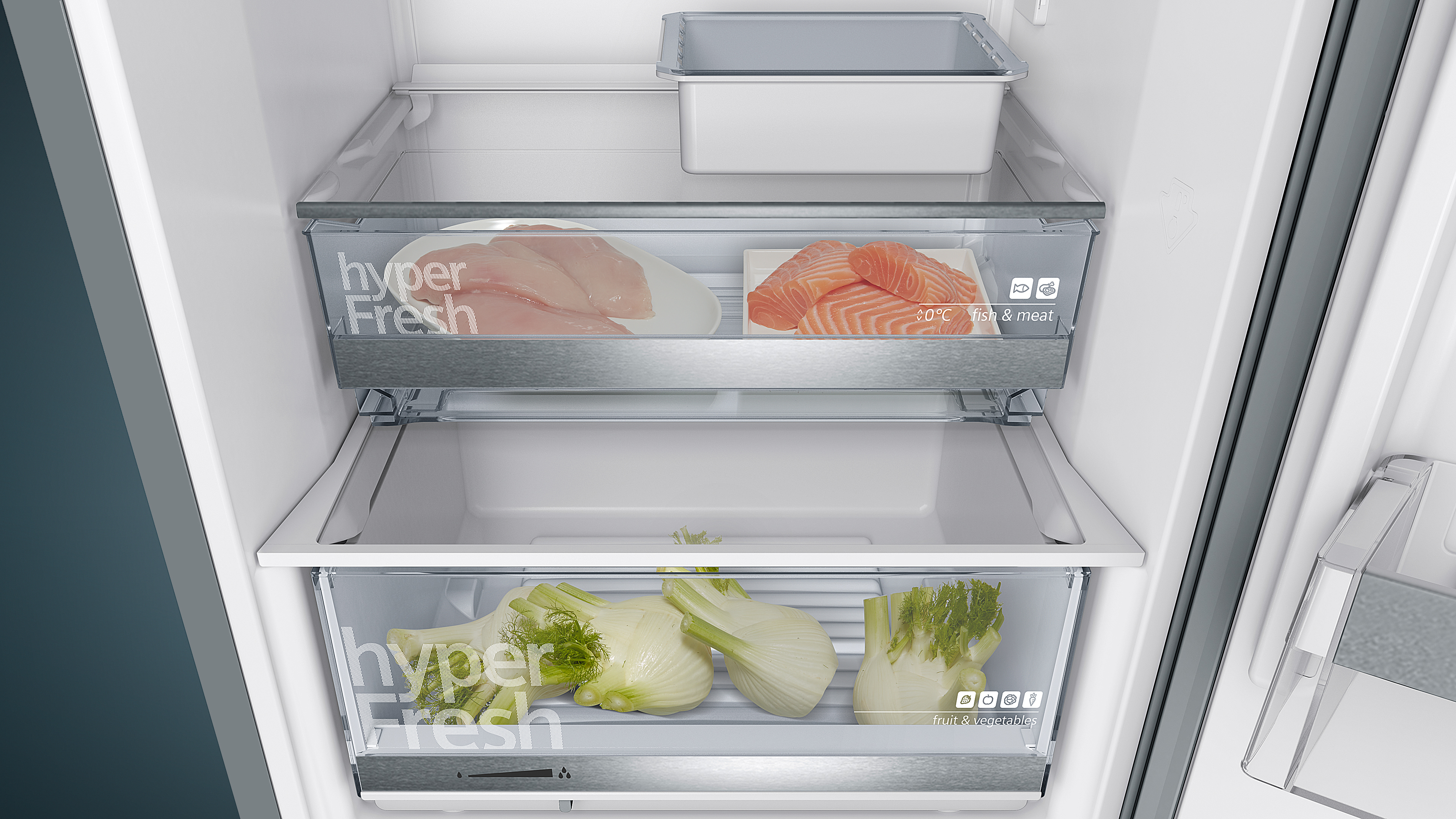 Refrigerator drawers with food: chicken, salmon, and fennel. Labels say 'hyperFresh'.