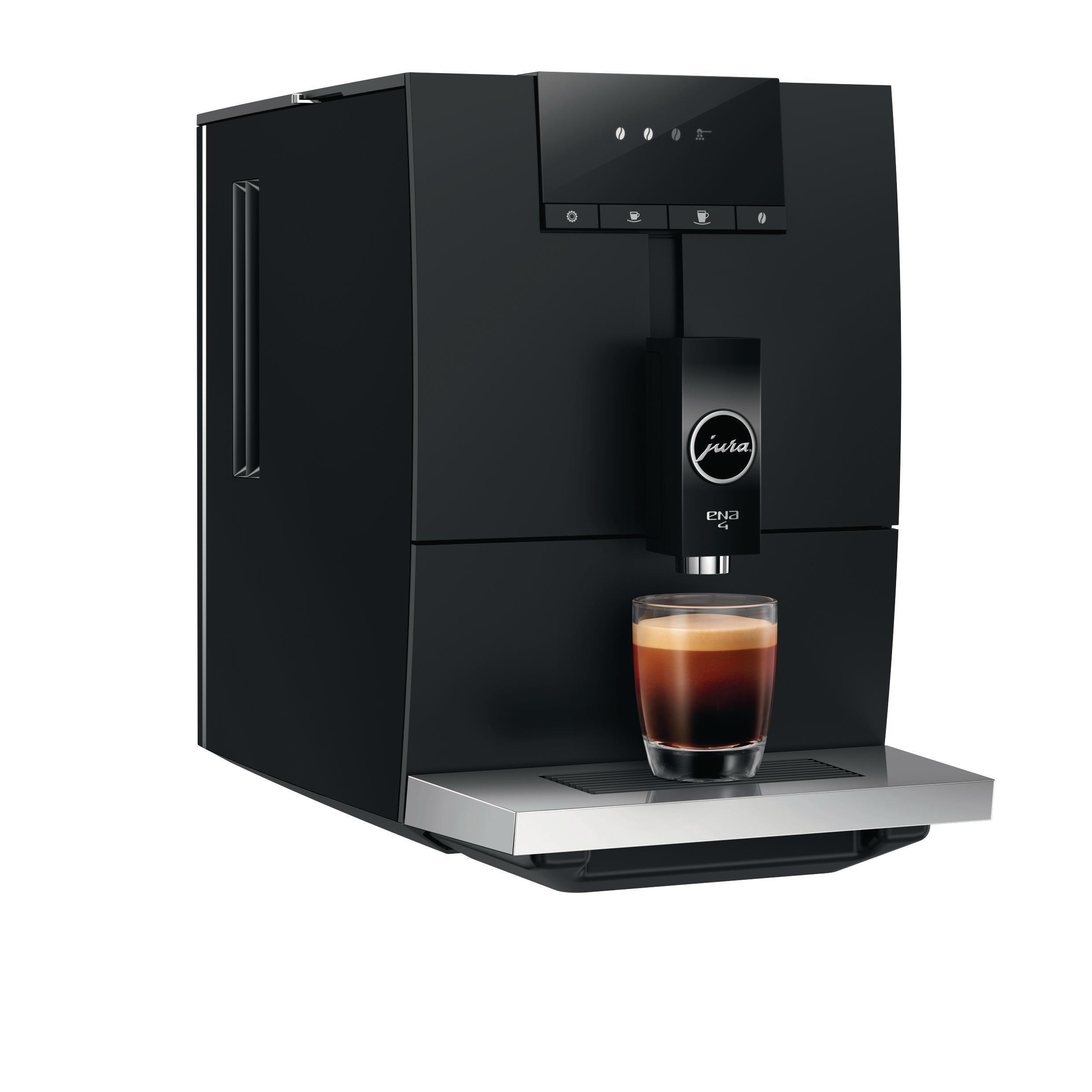 Schwarze Jura ENA 4 Espressomaschine mit einem Glas Kaffee. Ein Benutzer drückt eine Taste.