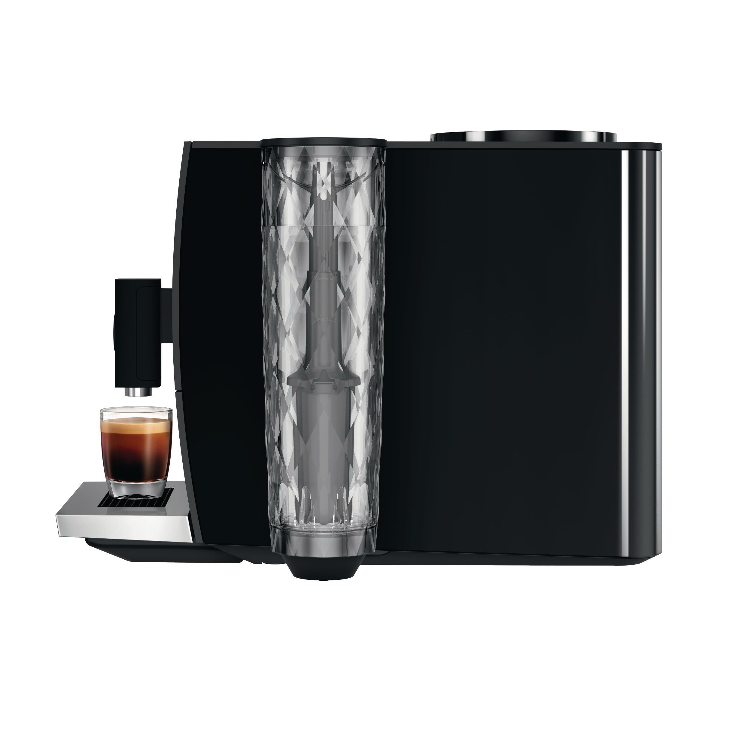 Eine schwarze Espressomaschine mit einem Glas Kaffee.