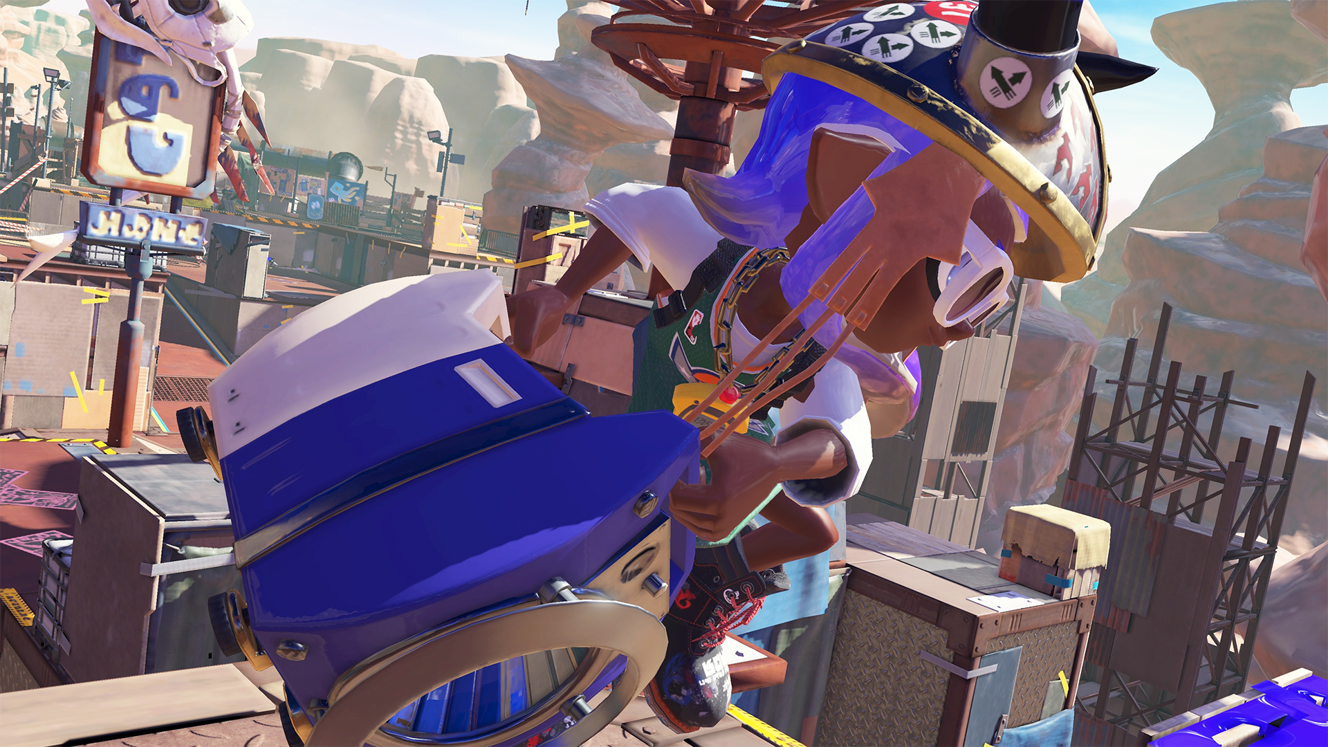 Eine Videospielszenen aus Splatoon 3, mit einer Figur, die über eine Struktur springt.